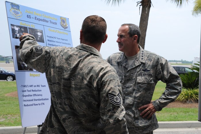 Tech. Sgt. Michael Payne briefs Gen. Raymond E. Johns Jr. on the 6S- Expediter Truck at Joint Base Charleston- Air Base, S.C. June 29. The general toured JB CHS- AB and Weapons Station during his two day visit. Johns is the Air Mobility Command commander and Payne is with the 437th Aircraft Maintenance Squadron. (U.S. Air Force photo/ Staff Sgt. Nicole Mickle)  