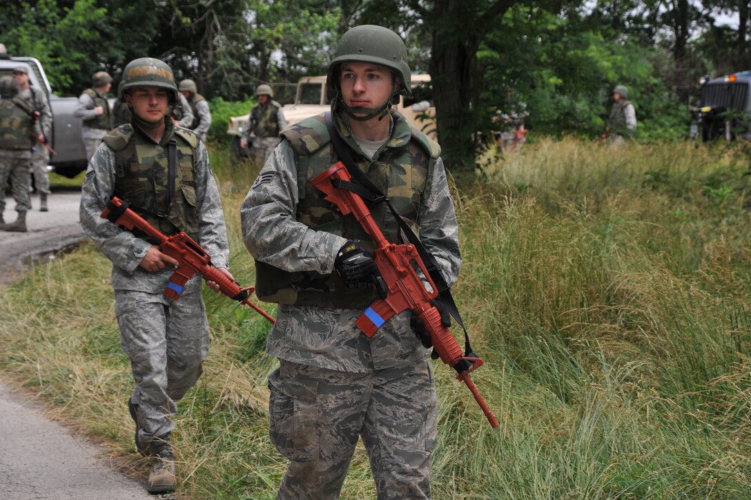 Senior Airman Brian Meyer leads a 932nd Civil Engineer Squadron patrol during the June drill.    Air Force Reserve civil engineers perform recurring combat skills training to maintain readiness.  The 932nd CES conducted convoy operations, field maneuvers and small team tactics.  (U.S. Air Force photo/Tech. Sgt. Chris Parr).