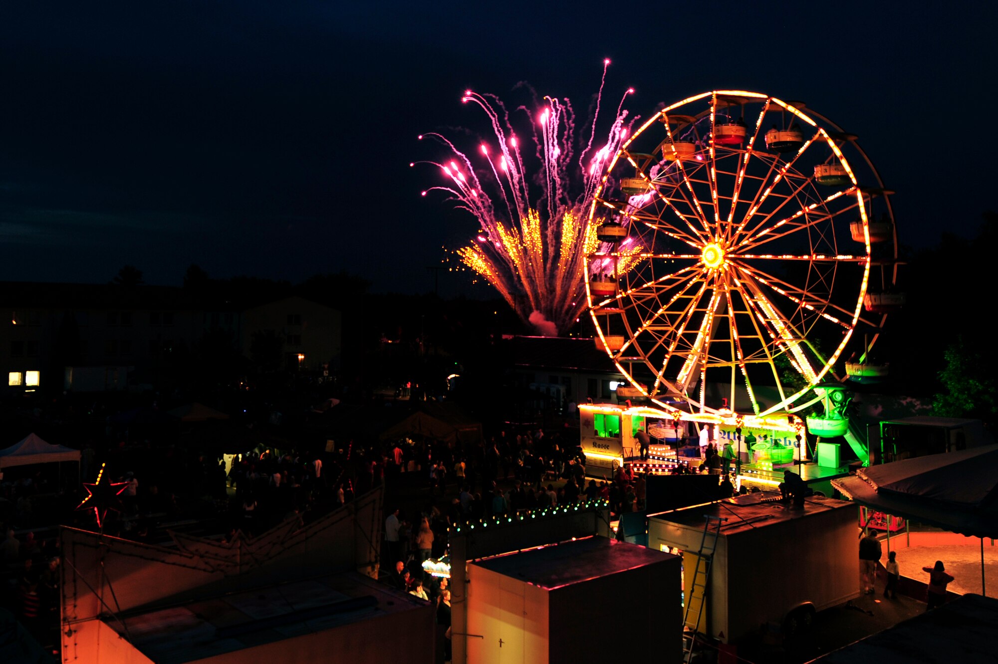 Fireworks marked the end of the 4th of July celebration at the Rockin' 2nd Independance Day event, Kapaun Air Station Germany, July 2, 2011.  The celebration was hosted by the 86th Force Support Squadron and included musical entertainment, children's activities, carnival rides, food specialties, prizes and a fireworks display.  (U.S. Air Force Photo by Tech. Sgt. Chenzira Mallory)