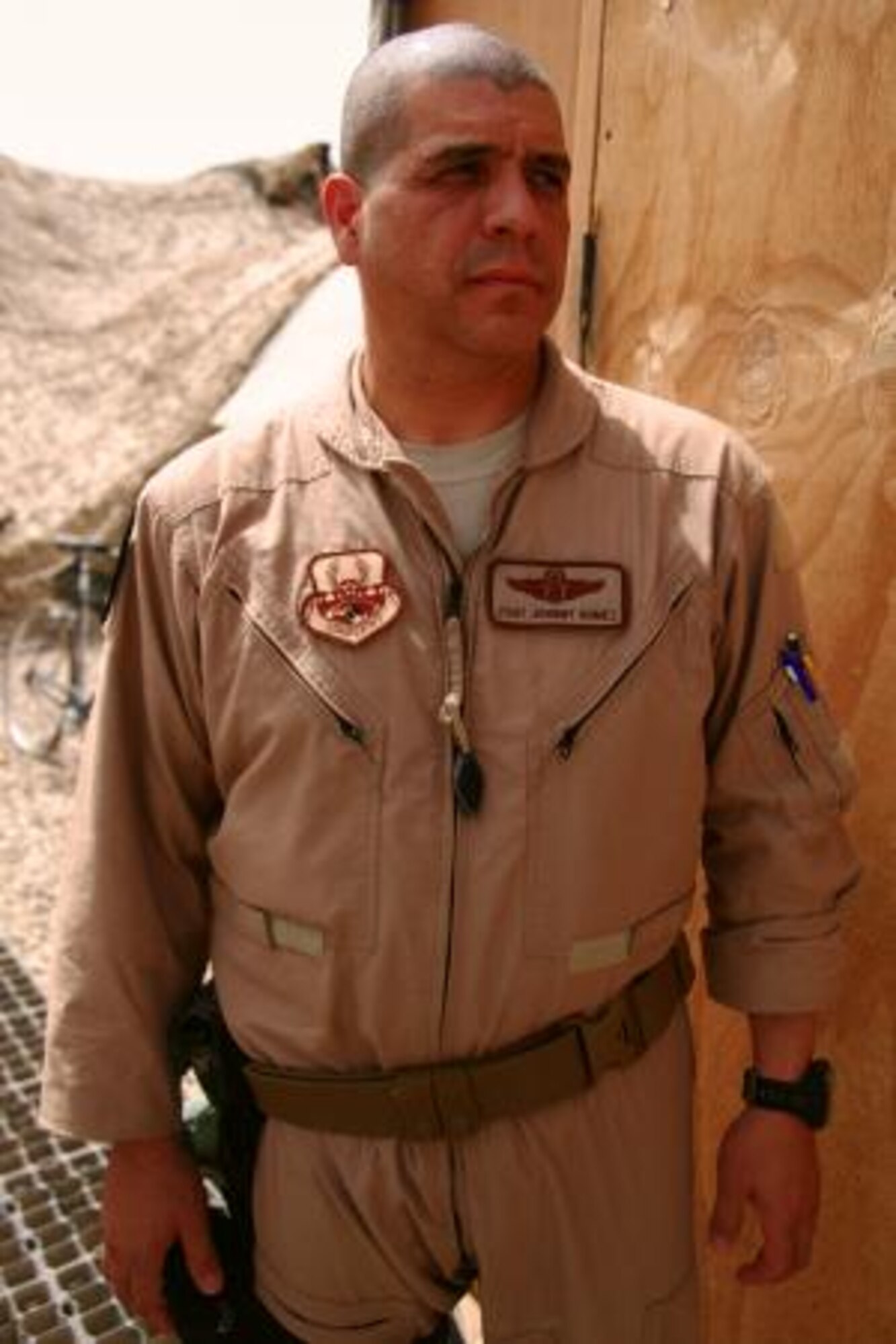 CAMP LEATHERNECK, Afghanistan -- Tech. Sgt. Johnny Gomez, of St. Mary County, Md., was born and raised in Medellin, Columbia, before he moved to Boca Raton, Fla., in 1982. Gomez is currently deployed to Helmand province, Afghanistan, as an aeromedical evacuation technician with the 651st Aeromedical Evacuation Squadron, Regional Command Southwest. (U.S. Marine Corps photo/Cpl. Katherine Keleher)