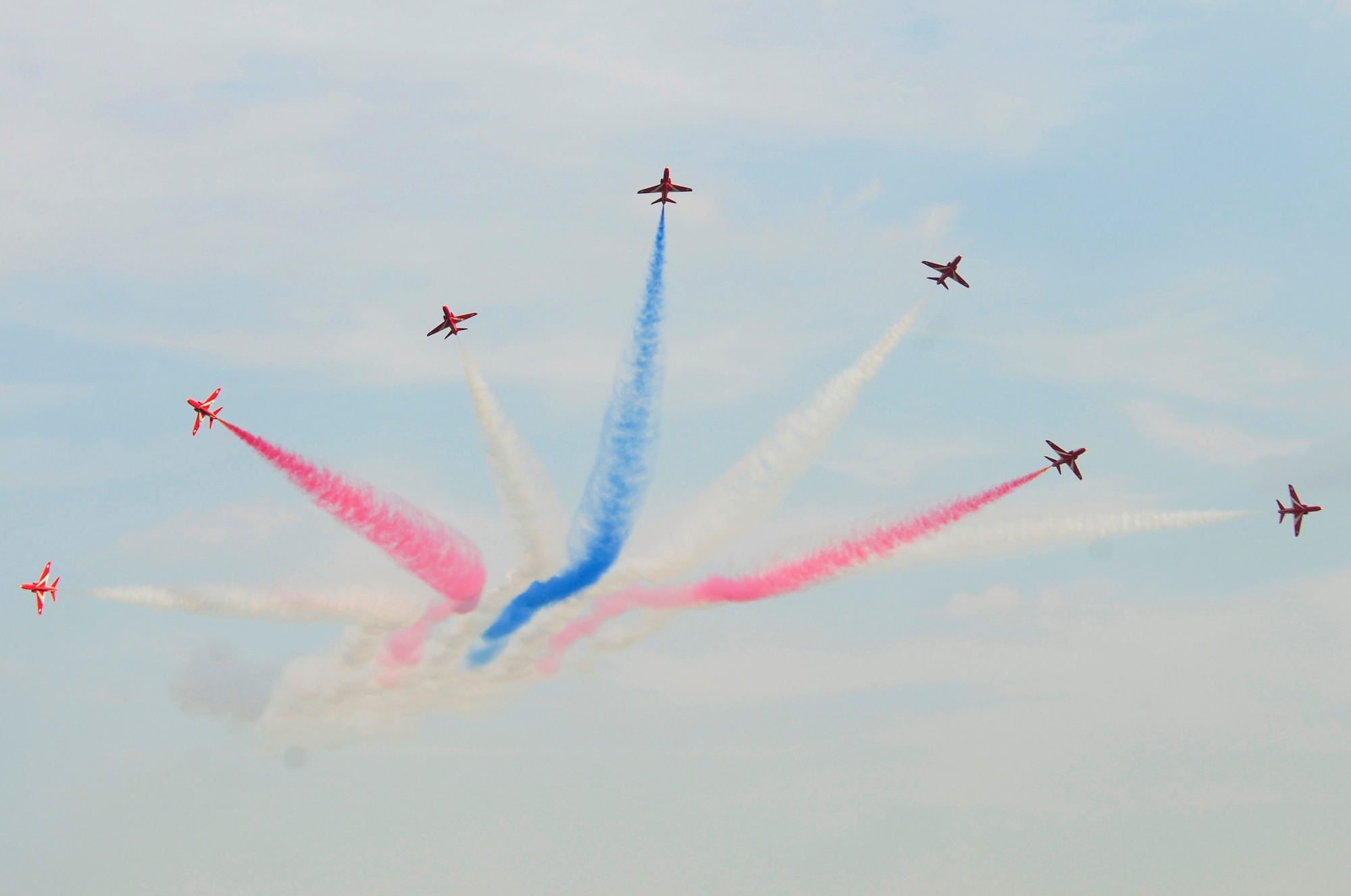 ROYAL AIR FORCE FELTWELL, England -- The Royal Air Force Red Arrows Aerobatic Team  performs during the Fourth of July celebration, July 4, 2011.  Airmen, their families and local community members came together to enjoy a carnival filled with food, games, rides, aerial displays and fireworks. (U.S. Air Force photo/Staff Sgt. Connor Estes)
