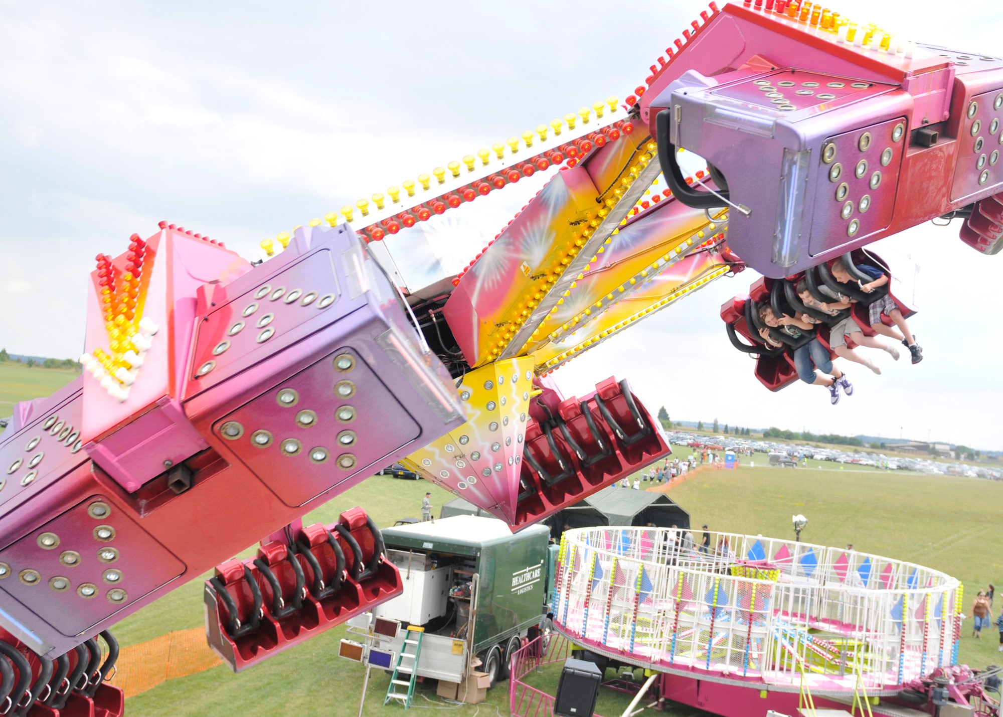 ROYAL AIR FORCE FELTWELL, England - Celebration participants ride a rollercoaster during the Fourth of July celebration, July 4, 2011.  Approximately 30,000 Airmen, their families and local community members came together to celebrate America’s Independence Day. Attendees enjoyed a variety of food, played games, watched aerial displays, rode carnival rides and watched fireworks. (U.S. Air Force photo/Senior Airman Tiffany M. Deuel)