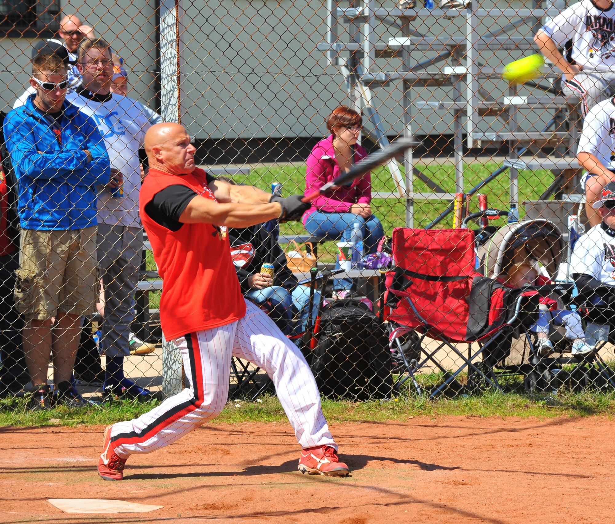 SPANGDAHLEM AIR BASE, Germany – Lyle Winnicki, Camp Darby, Italy, hits a softball during the Ammo Bowl tournament here July 3. The Ammo Bowl is held annually for service members stationed in Europe. The first-place trophy for the 25th annual Ammo Bowl went to Aviano Air Base, Italy. (U.S Air Force photo/Airman 1st Class Dillon Davis)