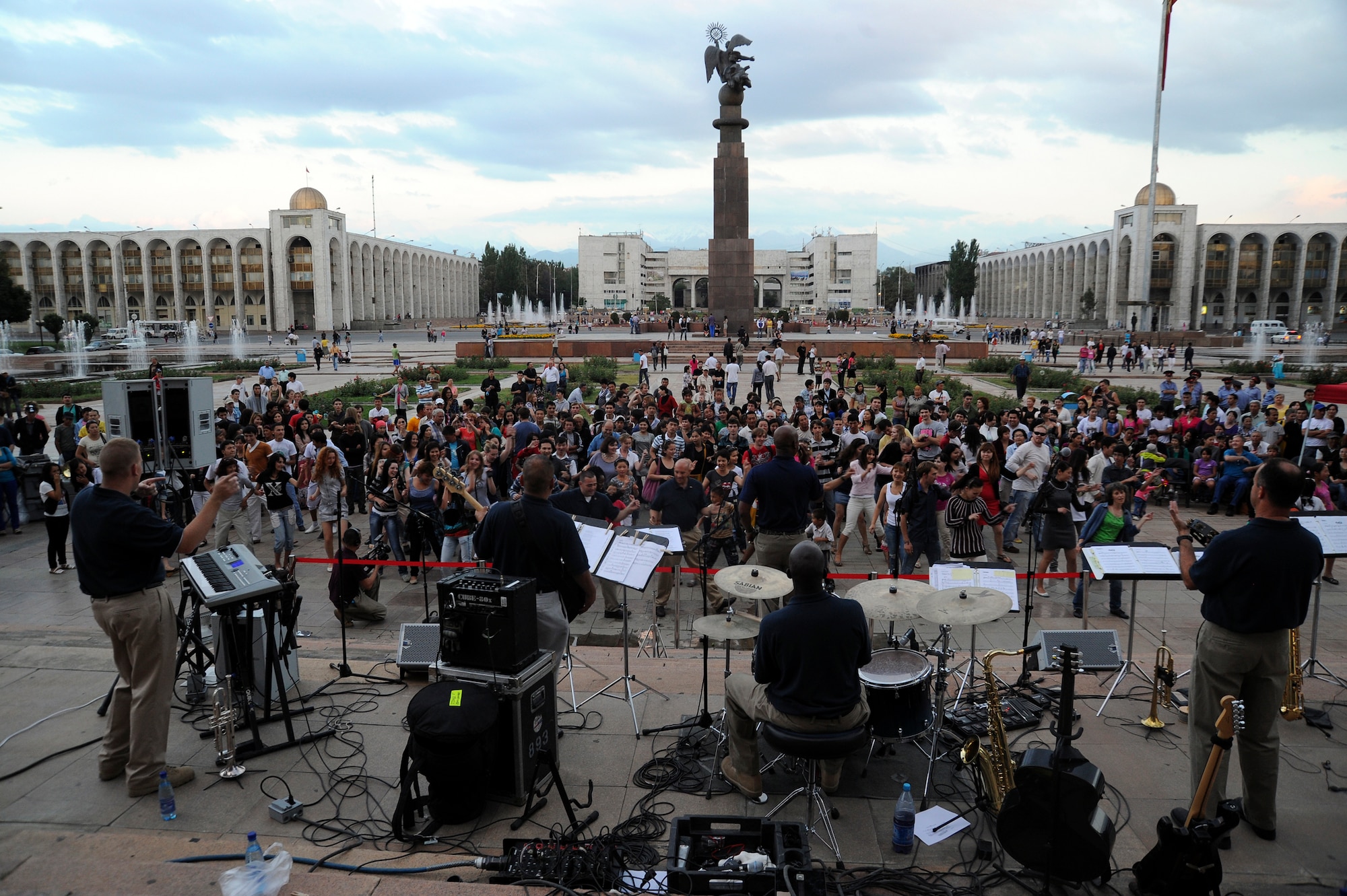 BISHKEK, Kyrgyzstan – The band “Blue Hawk” performs in front of the State Museum of History here July 2. In order to better connect with their Kyrgyz audience members the “Blue Hawk” performers learned the Kyrgyz national anthem before they arrived in country. The band is composed of U.S. Air Force Guardsmen assigned to Naval Air Station Fort Worth Joint Reserve Base, Texas. (U.S. Air Force photo/Staff Sgt. Matthew Smith)
