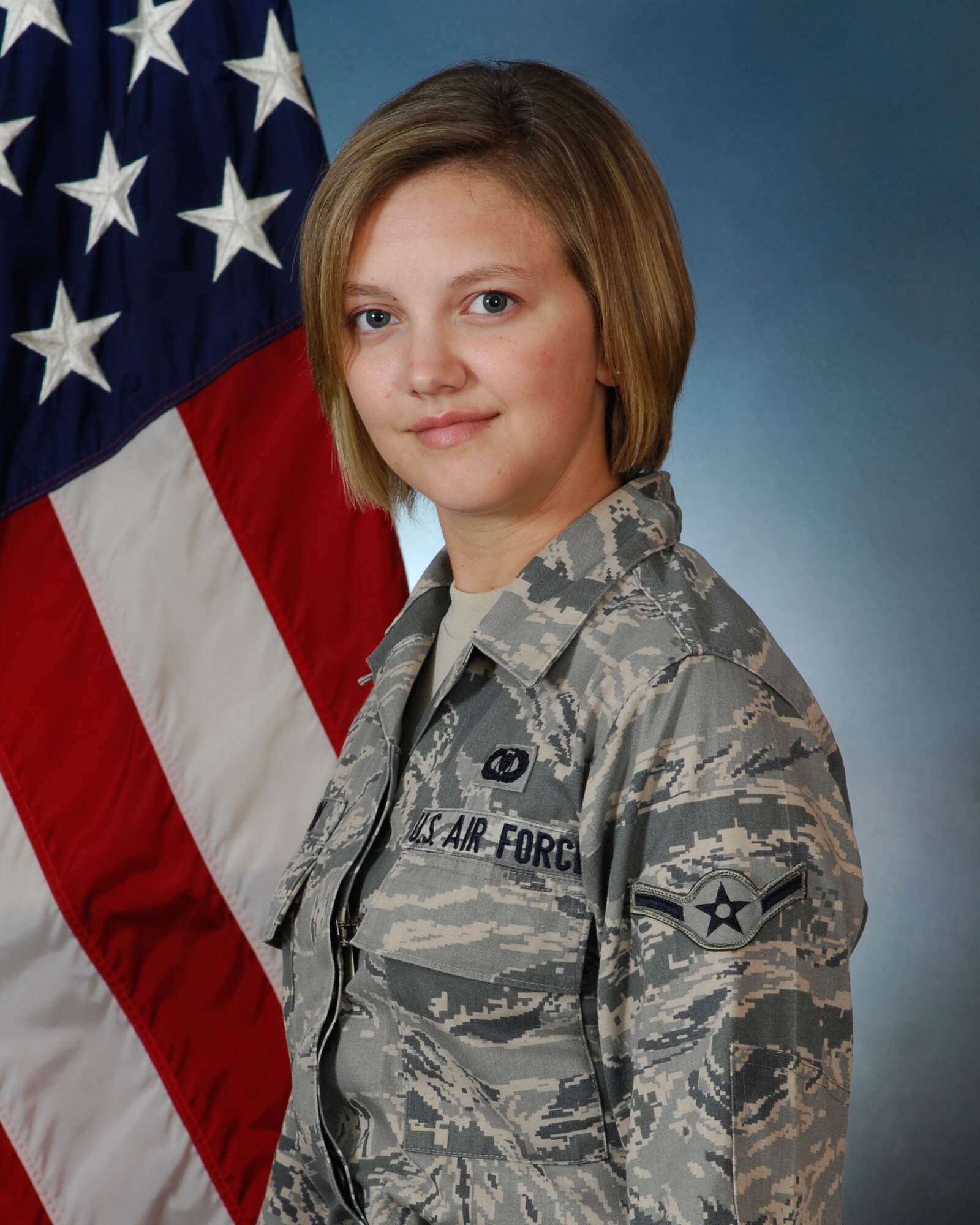 Kali Learn, 39th Operations Squadron, is promoted to the rank of airman June 30, 2011, at the Club Complex Ballroom at Incirlik Air Base, Turkey. (U.S. Air Force photo by Airman 1st Class Clayton Lenhardt /Released)