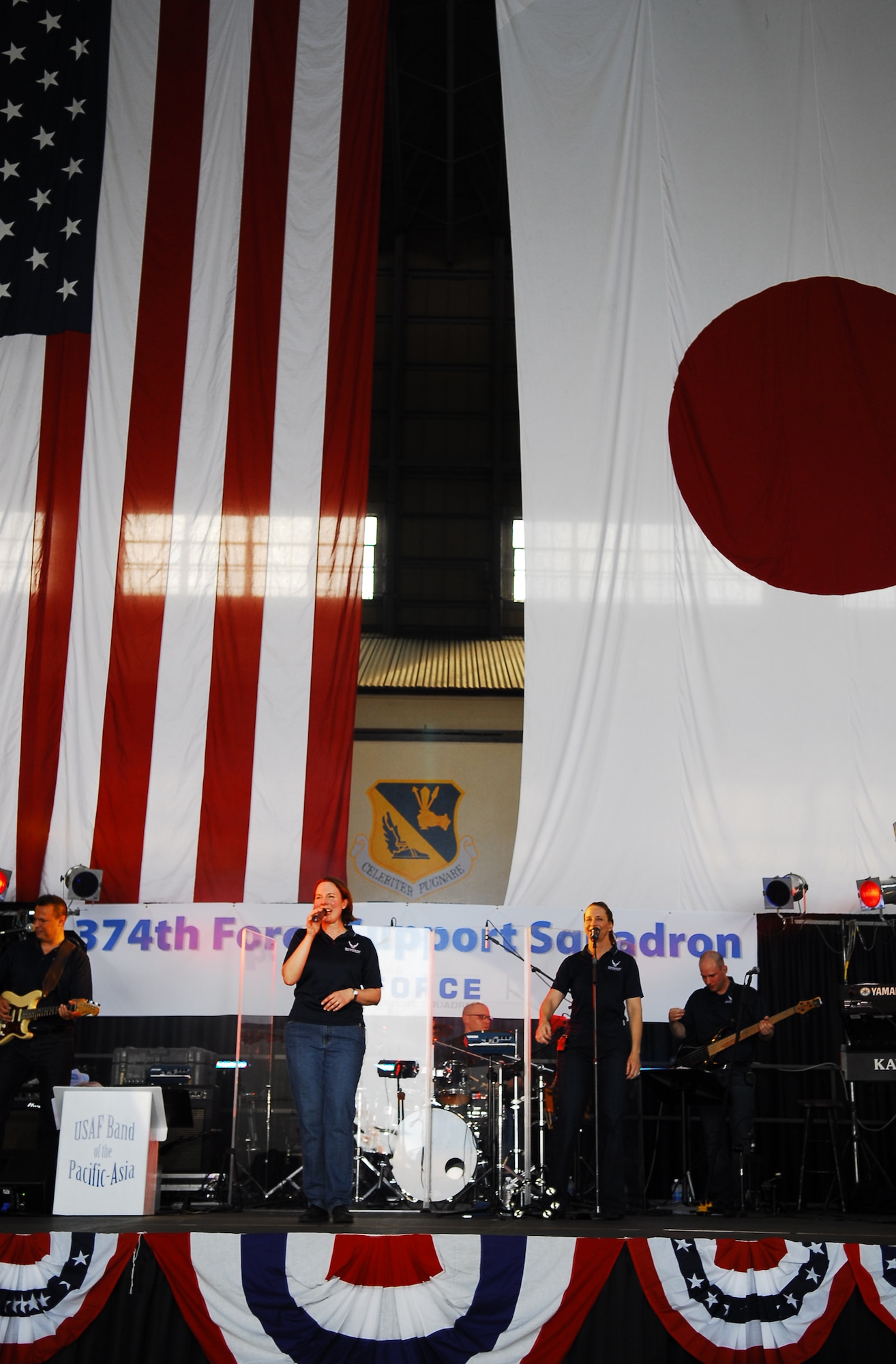 YOKOTA AIR BASE, Japan -- Members of the Air Force Band of the Pacific-Asia perform for attendees at the Celebrate America event held July 2, 2011, at Yokota Air Base, Japan. (U.S. Air Force photo/Staff Sgt. Robin Stanchak)