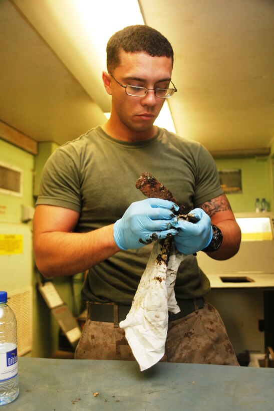 Lance Cpl. Armando Viruet, a native of Cleveland, performs repairs on hydraulic systems at Camp Bastion, Afghanistan, July 6. Viruet is an aircraft intermediate-level hydraulic/pneumatic mechanic with Marine Aviation Logistics Squadron 40.