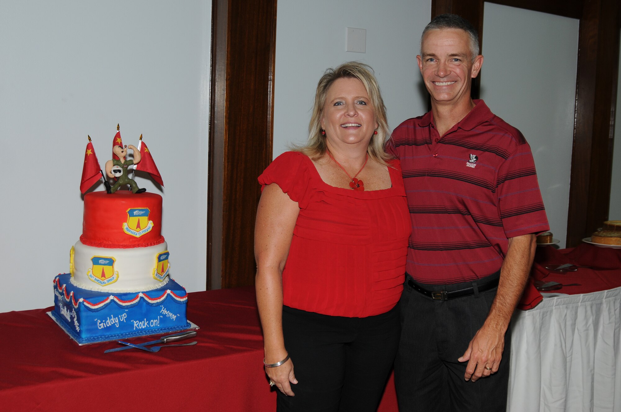 Col. Tod Fingal, former 36th Wing vice commander, poses for a photo with his wife Rhonda Fingal during their farewell dinner at the Sunrise Conference Center here, June 25. The dinner was followed by gifts from the 36th Wing squadrons showing their appreciation for the colonel's hard work and dedication.(U.S. Air Force photo/Senior Airman Carlin Leslie)
