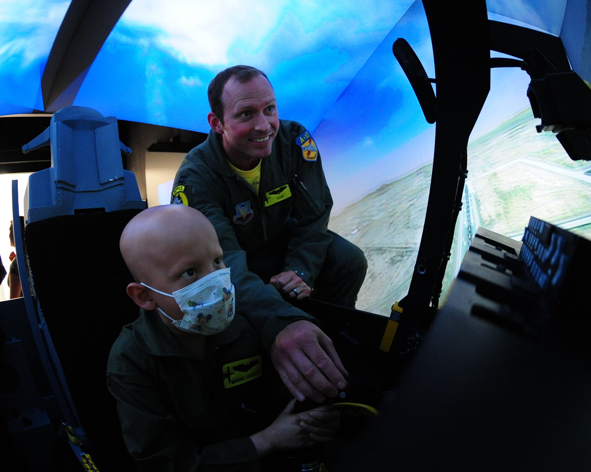 DAVIS-MONTHAN AIR FORCE BASE, Ariz. -Pilot for a Day participant, Michael Castillo, experiences the A-10 simulator in the 355th Operations Group as part of the Pilot for a Day program here June 24. (U.S. Air Force photo/Airman 1st Class Jerilyn Quintanilla)
