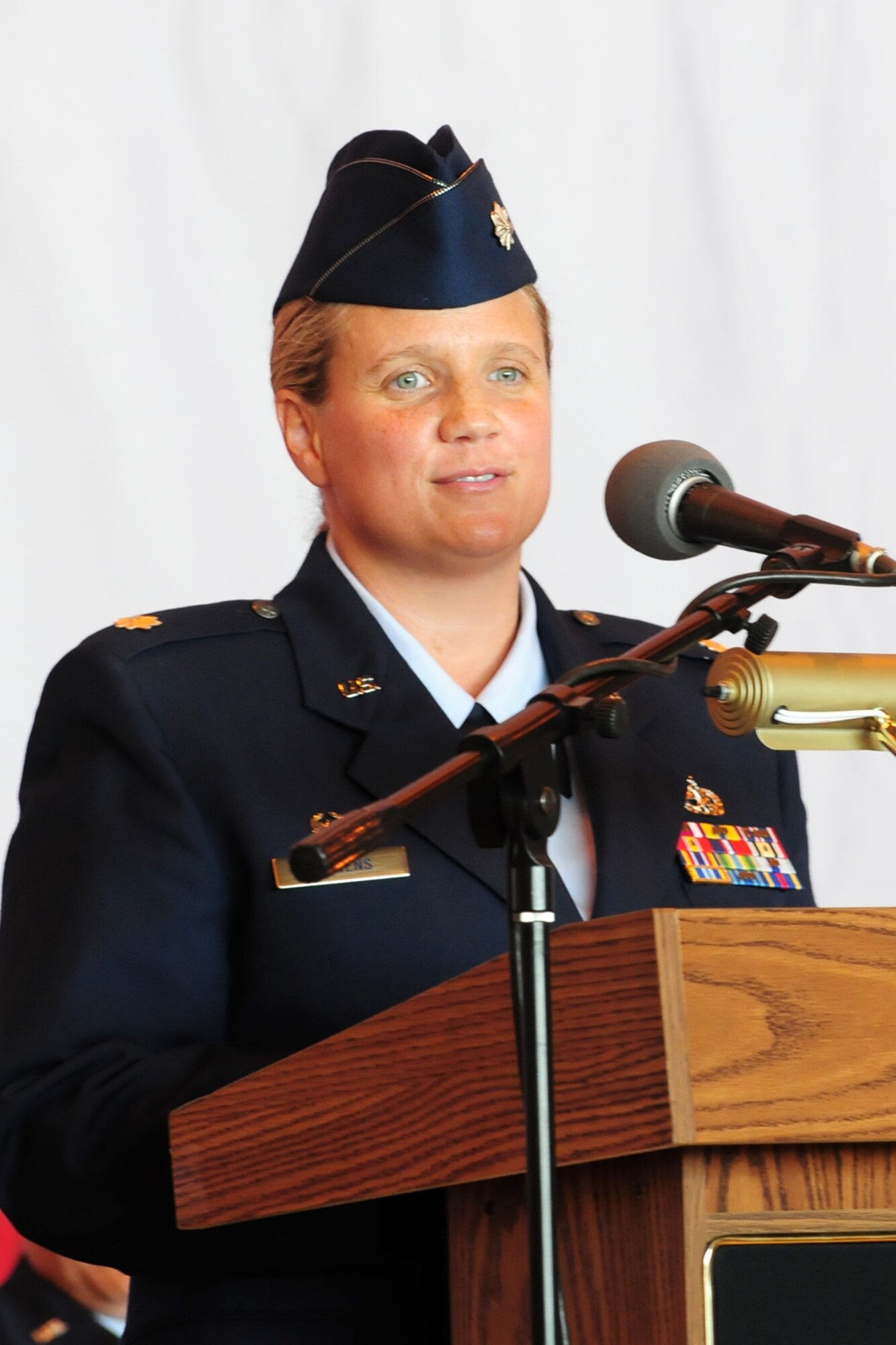 Lt. Col. Kelley C. Stevens accepts command of the 552nd Aircraft Maintenance Squadron in an official ceremony Jun 30. She challenged her squadron to develop a habit of excellence in everything you do from aircraft maintenance to being a supervisor and leader.  (Photo by Kelly White) 