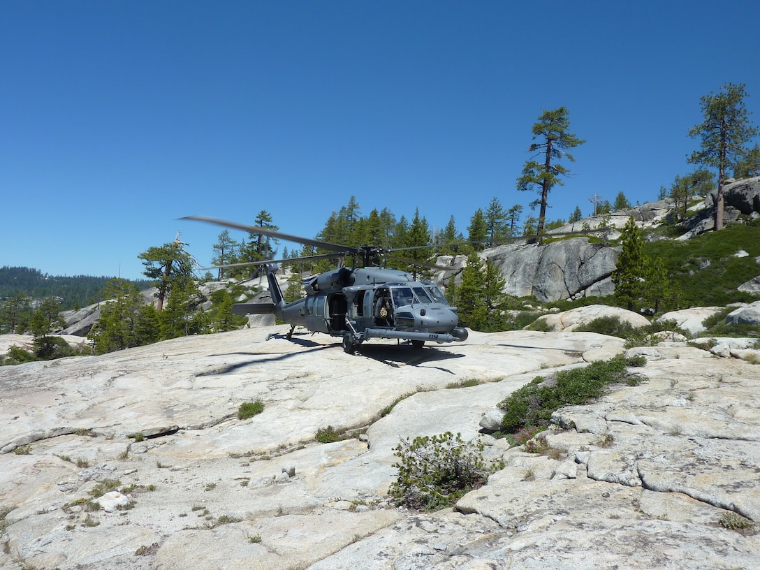 An HH-60G Pave Hawk helicopter from the 129th Rescue Wing lands in El Dorado National Forest, Calif. during a rescue mission on July 4, 2011.  An aircrew from 129th Rescue Wing rescued a lost hiker after she was missing in the forest for nearly 48 hours.  (California Air National Guard photo by Staff Sgt. Andrew Gibson)