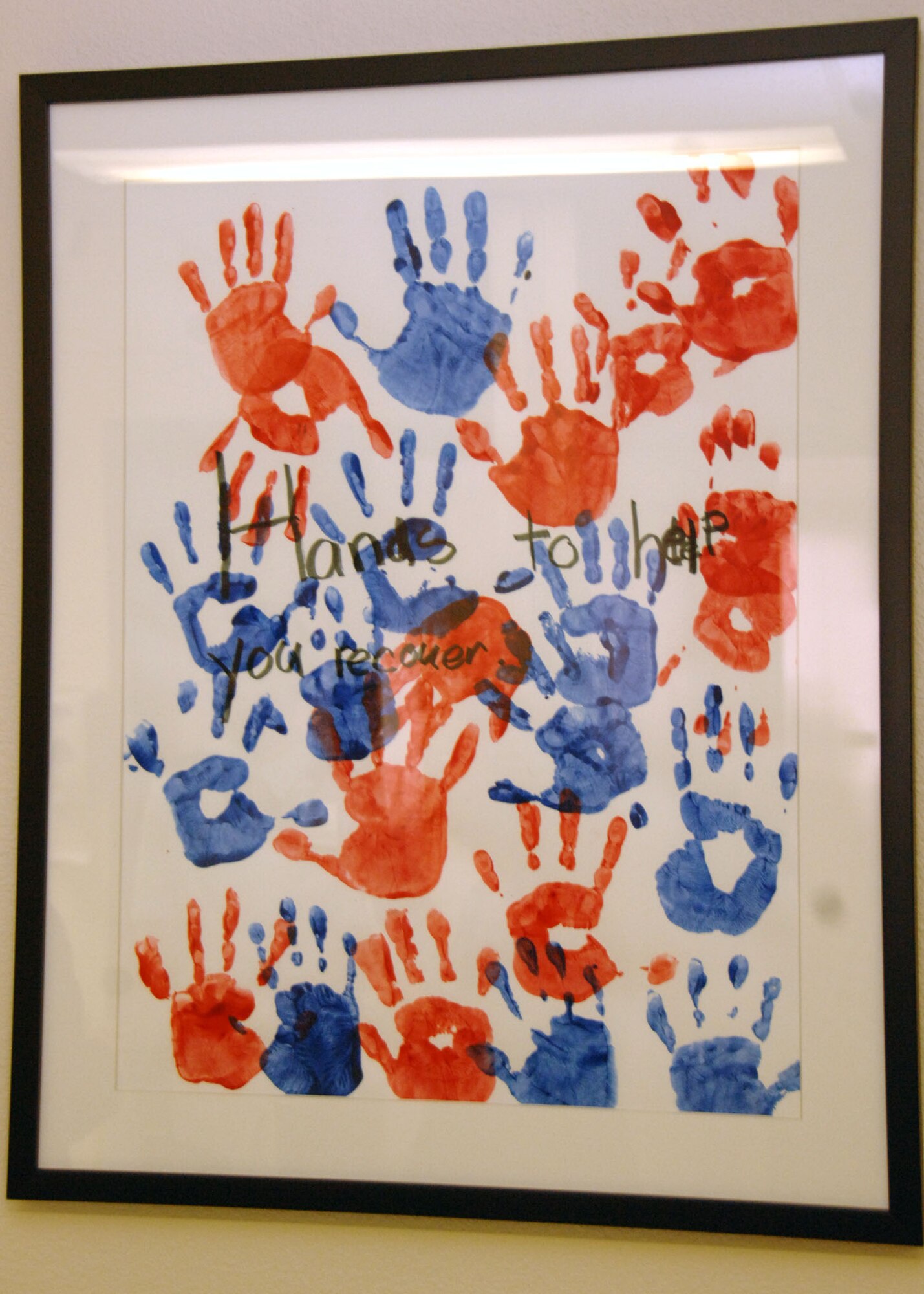 Donated artwork from elementary schools in San Antonio,Texas adorn the hallways of the 59th Contingency Aeromedical Staging Facility at Wilford Hall Medical Center, Lackland Air Force Base. 389 elementary students painted and sketched colorful images to help boost the morale of patients while they are provided medical care and a comfortable holding area while awaiting transportation to their final destination. (U.S. Air Force photo/Senior Airman Kevin Iinuma)
