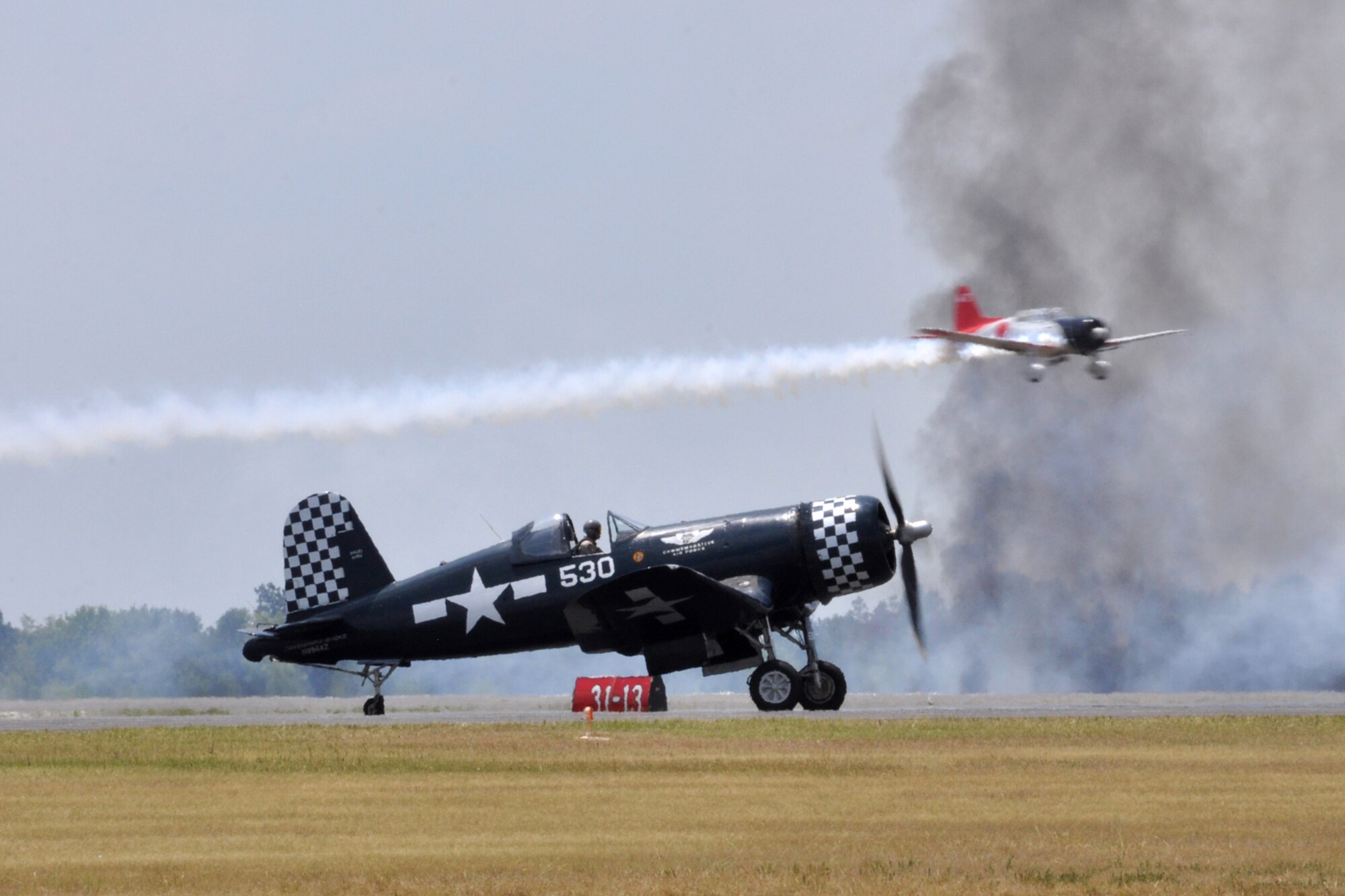 Chris Avery prepares to take off during the Tora! Tora! Tora! re-enactment at the “Wings Over Tyler Air Show” at Tyler Pounds Regional Airport, in Tyler, Texas, July 3, 2011. The “Tora, Tora, Tora” performance recreates the 1941 attack on Pearl Harbor. Designed as a living history lesson, “Tora! Tora! Tora!” is intended as a memorial to all the soldiers on both sides who gave their lives for their countries. Avery is a former U.S. Marine Corps Gunnery Sgt. and Scout Sniper. He plans to fly about 16 air shows this year. (U.S. Air Force photo/Tech. Sgt. Jeff Walston)