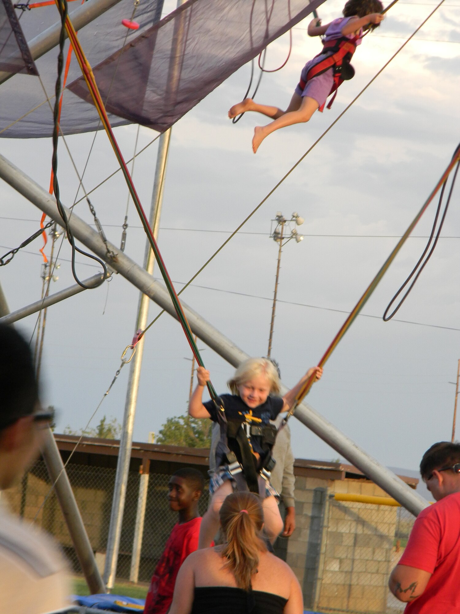 Children enjoyed several rides like the Euro Bungee during Summer Bash 2011, July 4th. (Air Force photo by Veronica Buening)