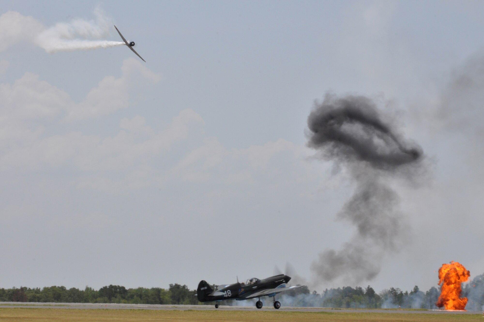 Mike Anderson taxis his Curtis P-40 Warhawk for take-off during the “Tora! Tora! Tora! re-enactment at the “Wings Over Tyler Air Show” at Tyler Pounds Regional Airport, in Tyler, Texas, July 3, 2011. The plane is owned by the Commemorative Air Force. Mr. Anderson has more than 4,000 total hours flying. The “Tora! Tora! Tora!” performance recreates the 1941 attack on Pearl Harbor. Designed as a living history lesson, “Tora! Tora! Tora!” is intended as a memorial to all the soldiers on both sides who gave their lives for their countries. (U.S. Air Force photo/Tech. Sgt. Jeff Walston)