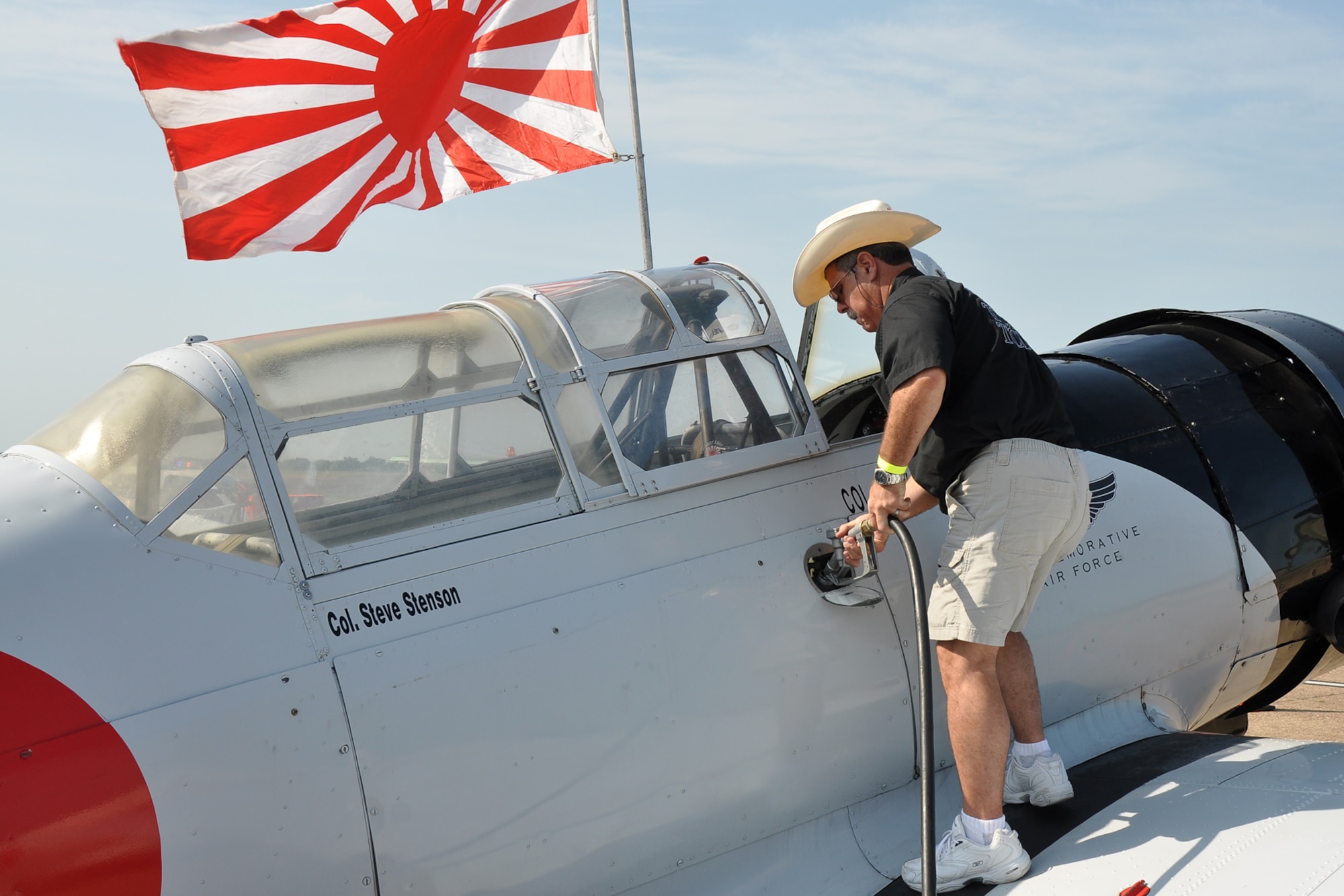 Graig Hutain, fuels his “Val” aircraft before performing in the “Wings Over Tyler Air Show” at Tyler Pounds Regional Airport, July 3, 2011. Hutain was flying a replica Japanese aircraft for the Commemorative Air Force’s “Tora! Tora! Tora!” performance, which recreates the 1941 attack on Pearl Harbor. Designed as a living history lesson, “Tora, Tora, Tora” is intended as a memorial to all the soldiers on both sides who gave their lives for their countries. The Aichi D3A, Allied reporting name “Val” was a World War II carrier-borne dive bomber of the Imperial Japanese Navy. It participated in almost all actions, including Pearl Harbor. (U.S. Air Force photo/Tech. Sgt. Jeff Walston)