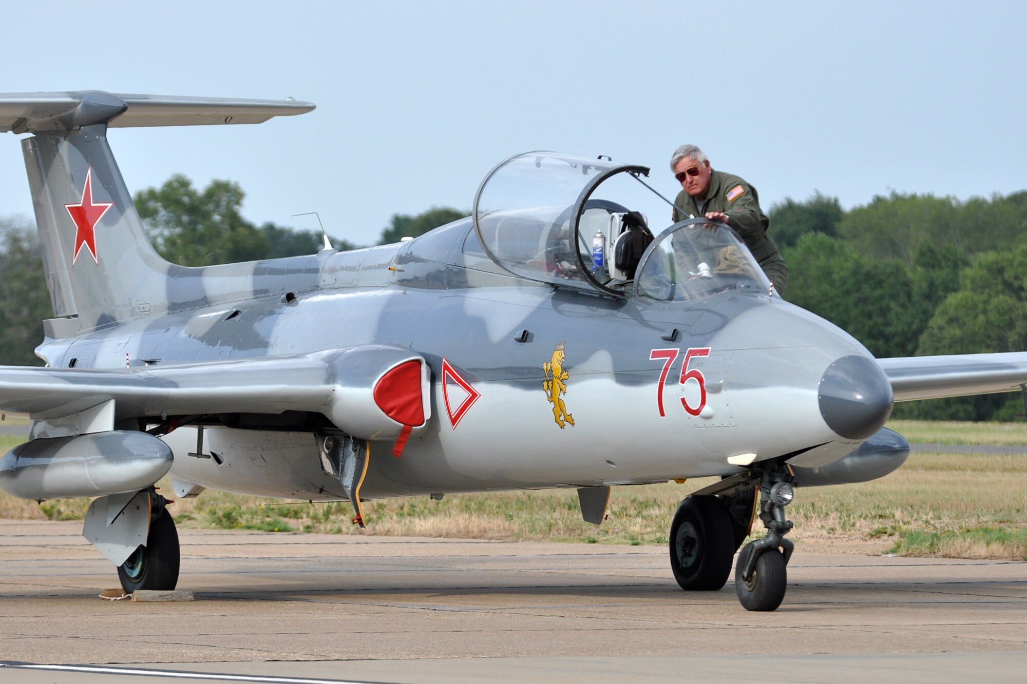 Noel Rather, a former captain with the U.S. Air Force, prepares his L-29 Delphin before taking off to participate in the Cedar Creek Lake Air Show, “Thunder Over Cedar Creek Lake,” near Mabank, Texas, July 2, 2011. Rather launched his aircraft from Tyler Pounds Regional Airport in Tyler, Texas. The Areo L-29 Delphin is a military jet trainer aircraft that became the standard jet trainer for the air forces of the Warsaw Pact nations in the 1960s. It was Czechoslovakia’s first locally designed and built jet aircraft. Rather, with his L-29 Delphin was also one of the featured performers at the “Wings Over Tyler Air Show” at the Tyler Pounds Regional Airport, July 3, 2011. (U.S. Air Force photo/Tech. Sgt. Jeff Walston)