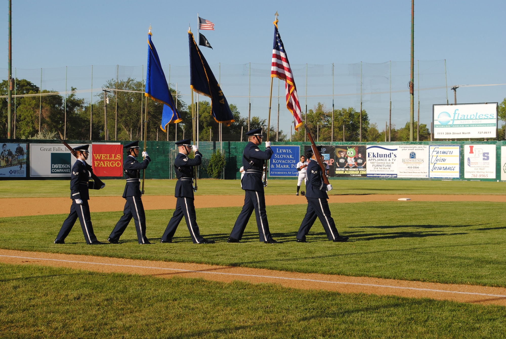 Members of Malmstrom Air Force Base's Honor Guard present the colors before the national anthem during Military Appreciation Night at Centene Stadium June 25.  (U.S. Air Force photo/Airman Cortney Hansen)