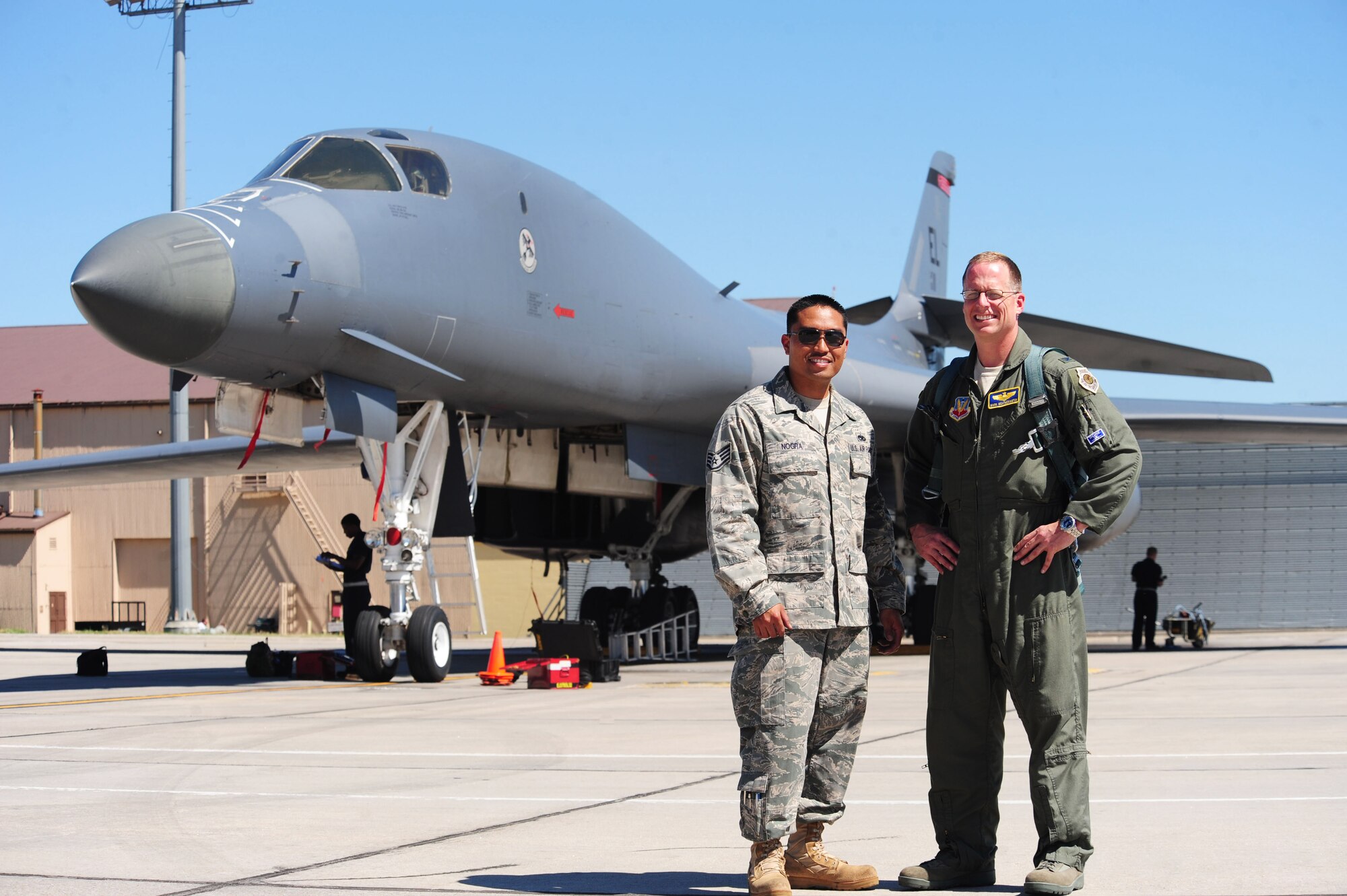 Col. Mark Weatherington, 28th Bomb Wing commander, stands on the Ellsworth Air Force Base, S.D. flightline with Staff Sgt. Walterio Nogra, 28th Aircraft Maintenance Squadron crew chief. Nogra is the 2010 Ellsworth Crew Chief of the Year. (U.S. Air Force photo/Airman Alystria Maurer/Released)