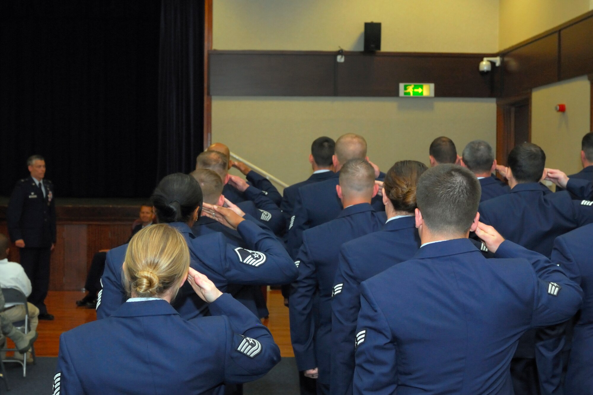 RAF CROUGHTON, United Kingdom - Airmen from the 422nd Communications Squadron give their final salute to Col. Stephen Conkling during a change of command ceremony July 5 at the Croughton Community Center. Major Adisa Hinton replaces Conkling as the commander of the 422nd CS. (U.S. Air Force photo by Master Sgt. Randy Hillsgrove)