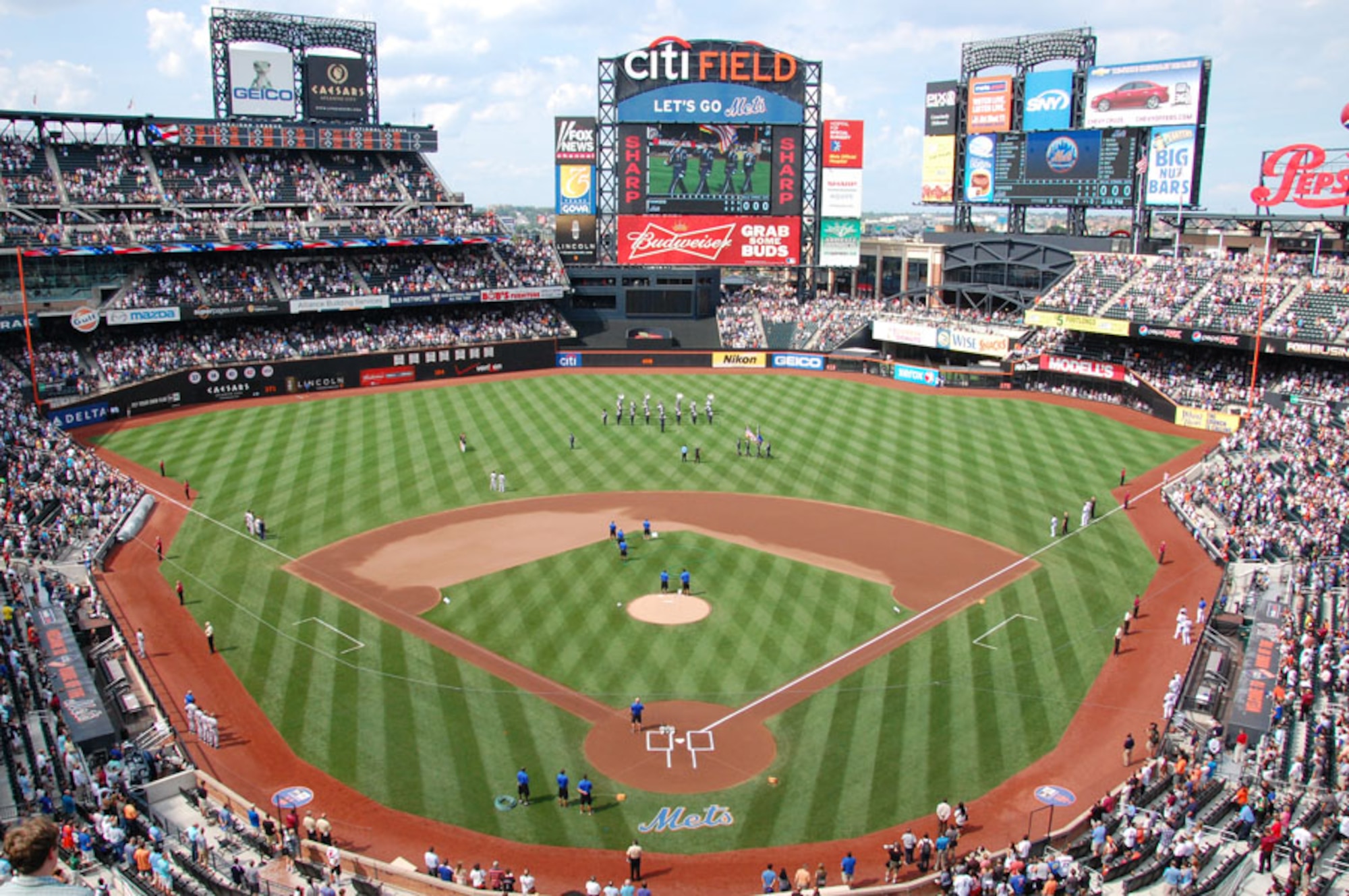 The U.S. Air Force Ceremonial Brass band performs the National Anthem July 2 at Citi Field for the New York Mets vs. New York Yankees baseball game. The USAF Band also played on NBC's Today Show for Independence Day. (U.S. Air Force photo by Capt. Bryan Bouchard)