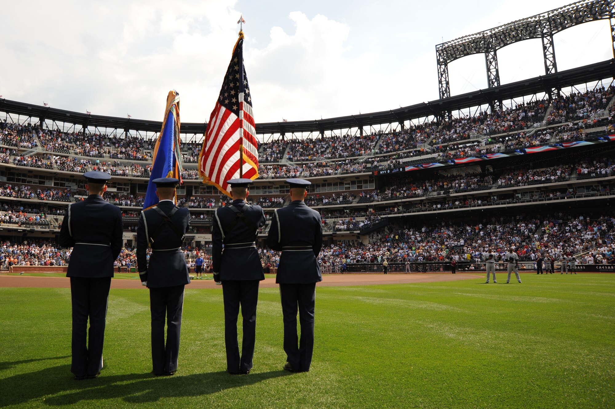 The U.S Air Force Honor Guard color guard presents the nation’s flag to almost 42,000 baseball fans at Citi Field July 2 in New York. The USAF Honor Guard and The U.S. Air Force Band were invited to perform at the Mets vs. Yankees game in celebration of the Independence Day weekend. (U.S. Air Force photo by Staff Sgt. Christopher Ruano)
