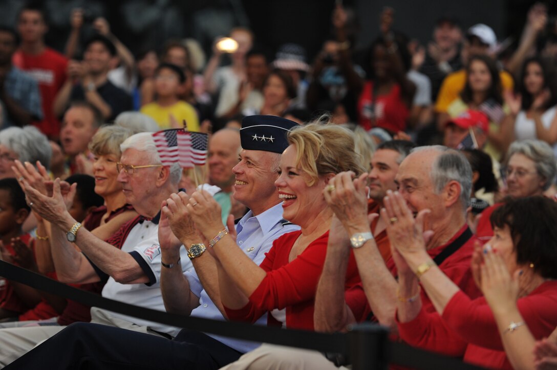 Lt. Gen. Richard Y. Newton III, Assistant Vice Chief of Staff and Director, Air Staff, applauds the performance of The U.S. Air Force Band during their Independence Day performance at the Air Force Memorial July 4 in Arlington, Va. Richard was invited as the presiding officer for the event by Col. A. Phillip Waite, Commander and Conductor of the USAF Band. (U.S. Air Force photo by Staff Sgt. Christopher Ruano)