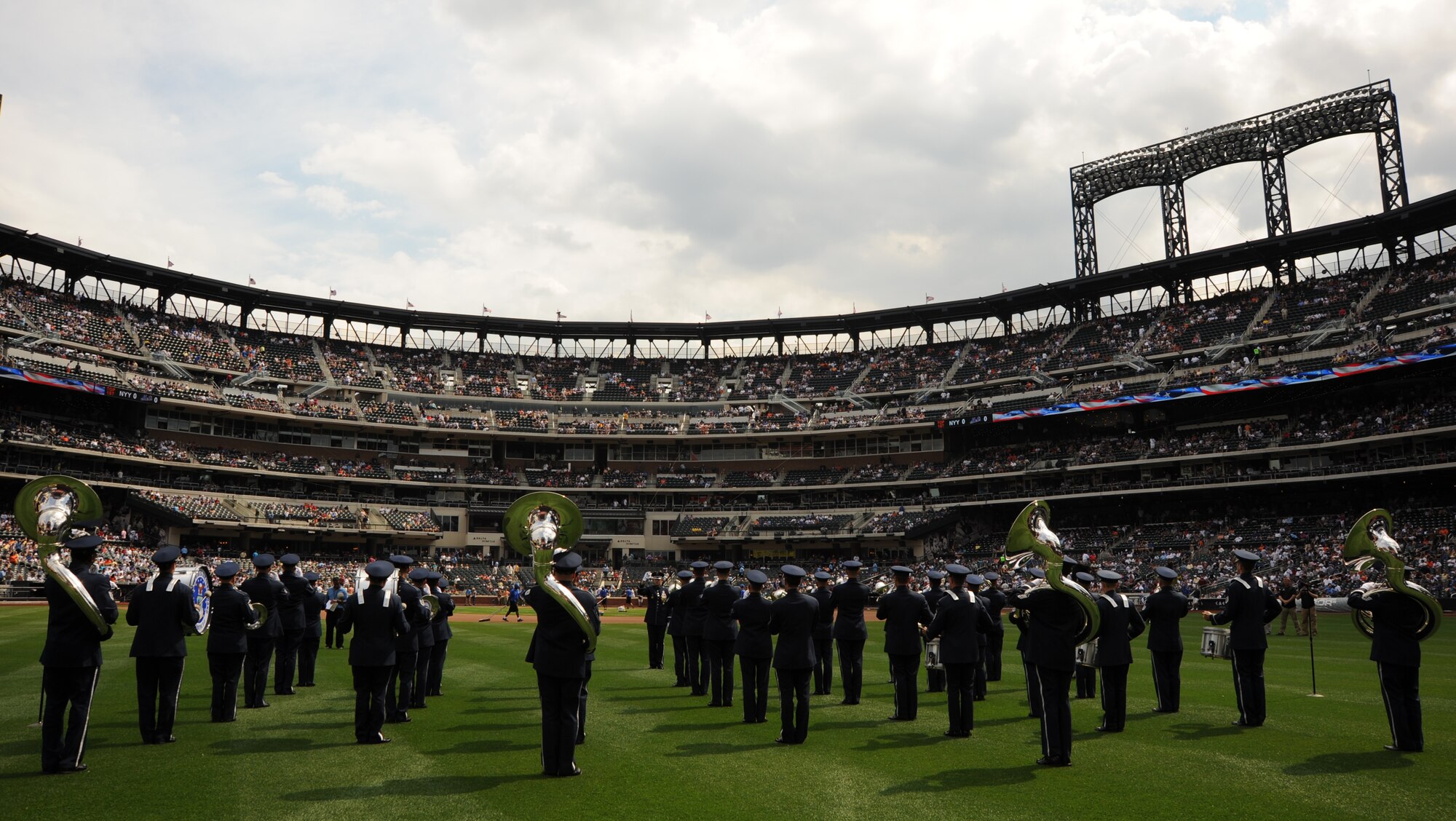 The U.S.  Air Force Band takes the outfield to inspire fans and perform the National Anthem before the Mets vs. Yankees baseball game at Citi Field July 2 in New York. The USAF Band was invited to perform before the opening pitch of the Mets vs. Yankees baseball game. (U.S. Air Force photo by Staff Sgt. Christopher Ruano)