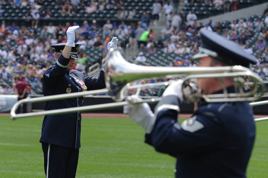 Col. A. Phillip Waite, commander and conductor of The U.S. Air Force Band, leads the ceremonial brass in the opening performance at the Mets vs. Yankees baseball game at Citi Field July 2, 2011, in New York.  (U.S. Air Force photo/Staff Sgt. Christopher Ruano)