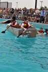 KUNSAN AIR BASE, Republic of Korea -- Airmen participate in the cardboard boat regatta during the “Fourth on the First” Independence Day celebration here July 1. It was one of many events held on base to celebrate America’s day of freedom. (U.S. Air Force photo/Senior Airman Brittany Y. Bateman)