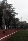 KUNSAN AIR BASE, Republic of Korea -- Airmen run the 880 yard course while participating in the Marine Corps Combat Fitness Test here July 1. The test consisted of movement to contact; 880 yard run, 30 pound ammunition lift and the maneuver under fire, which was a 300 yard shuttle run that includes a variety of combat-related tasks, to include: crawls, buddy drags and carries, ammunition resupply, grenade throw and agility running. (U.S. Air Force photo/Senior Airman Brittany Y. Bateman) 