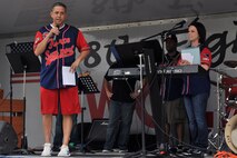 KUNSAN AIR BASE, Republic of Korea -- Maj. Matthew Groleau, 8th Force Support Squadron commander, gives the opening remarks before the start of the “Fourth on the First” Independence Day celebration here July 1. Events included a bowling tournament, a cardboard boat regatta, a hotdog eating contest, amazing race and a tae kwon do demonstration. (U.S. Air Force photo/Senior Airman Brittany Y. Bateman)