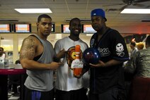 KUNSAN AIR BASE, Republic of Korea -- The winning bowling team pose for a photo during the “Fourth on the First” celebration here July 1. (U.S. Air Force photo/1st Lt. Trisha Eldridge)