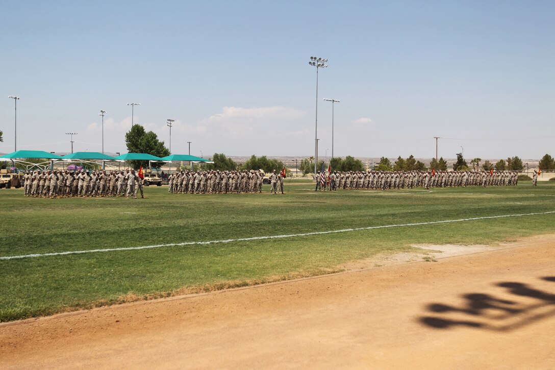 Marines and sailors with 3rd Battalion, 7th Marine Regiment, stand in formation for the Post and Relief Ceremony of Sgt. Maj. Troy Black, the outgoing sergeant major, and Sgt. Maj. Rafael Rodriguez, the oncoming sergeant major, at Felix Field July 7, 2011.
