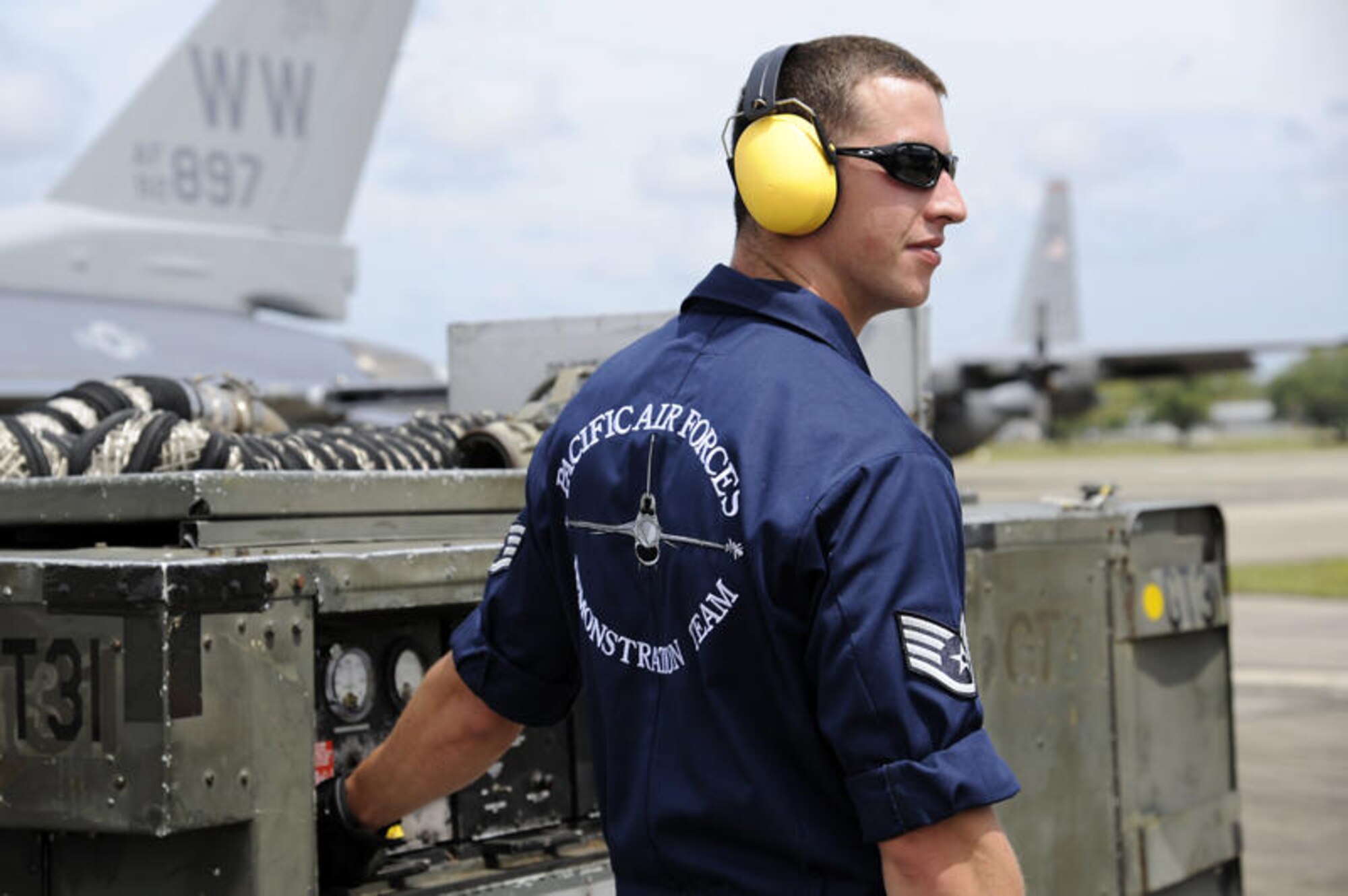 RIMBA AIR BASE, Brunei -- Staff Sgt. Jonathan Crocker, Pacific Air Forces Demonstration Team member, waits for the signal to shut down the generator at Rimba Air Base, Brunei July 2. The PACAF Demonstration team along with other members of the 35th Fighter Wing arrived in Brunei July 1 to prepare for the 3rd Biennial Brunei Darussalam International Defense Exhibition 2011 scheduled for June 6-9. (U.S. Air Force photo/Staff Sgt. Marie Brown/Released)