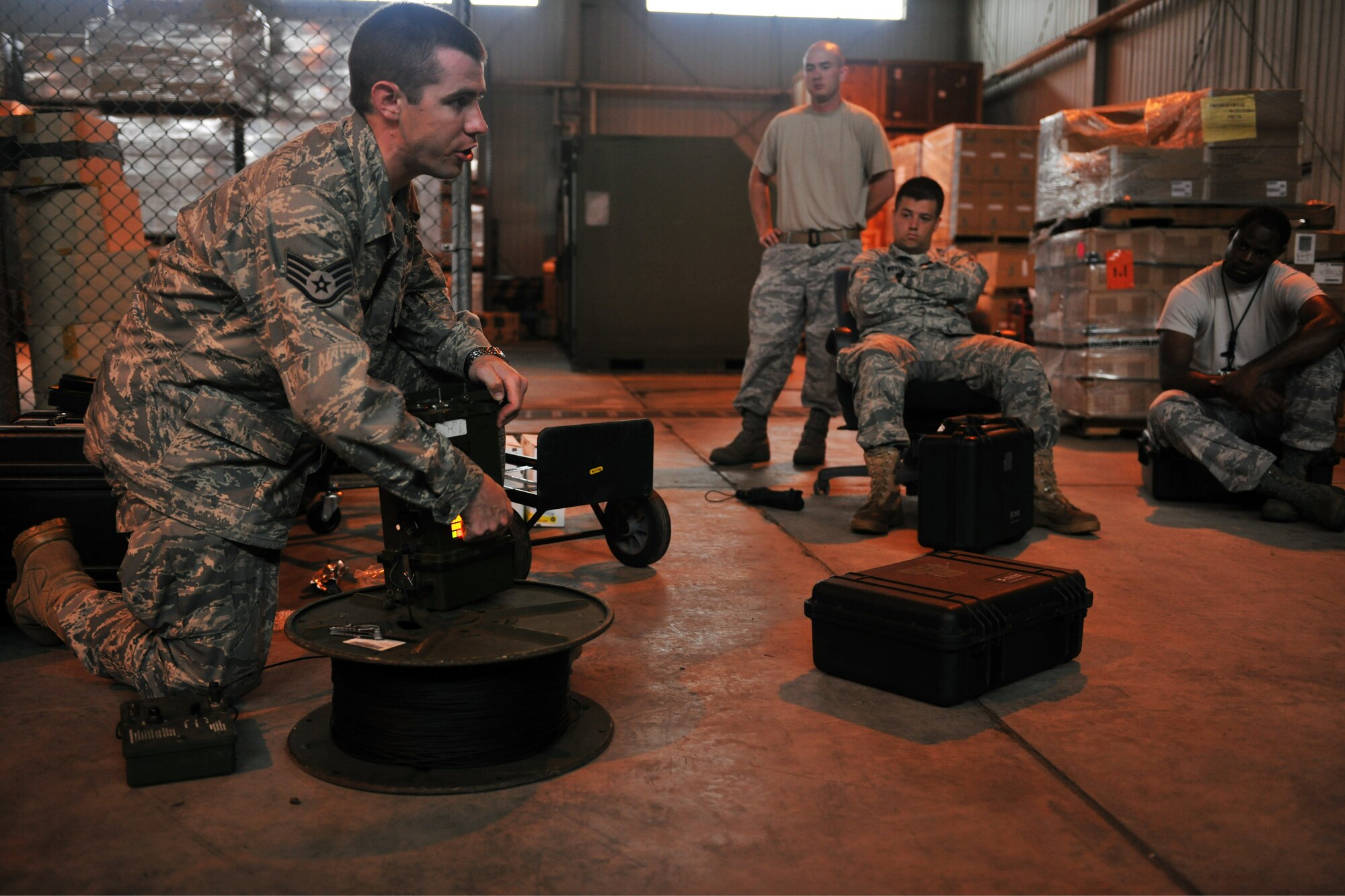 KUNSAN AIR BASE, Republic of Korea -- Staff Sgt. Jonathan Dobson, 8th Civil Engineer Squadron emergency management, briefs Airmen on how to use a M22 Automatic Chemical Agent Alarm during readiness support team training here July 7. The M22 ACADA is an automatic chemical agent alarm system capable of detecting, warning and identifying standard blister and nerve agents simultaneously. (U.S. Air Force photo/Senior Airman Brittany Y. Bateman)