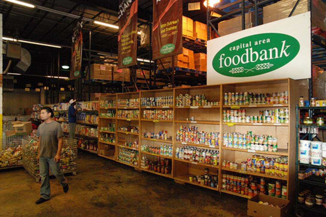 Commissaries in the U.S. have joined with other government agencies and organizations to support the 2011 Feds Feed Families food drive campaign, which runs through Aug. 31, 2011. The food drive is coordinated by the U.S. Office of Personnel Management and the Chief Human Capital Council to encourage federal employees to help supplement food banks across the country, such as the one shown here.  (Courtesy photo/Rob Joswiak)