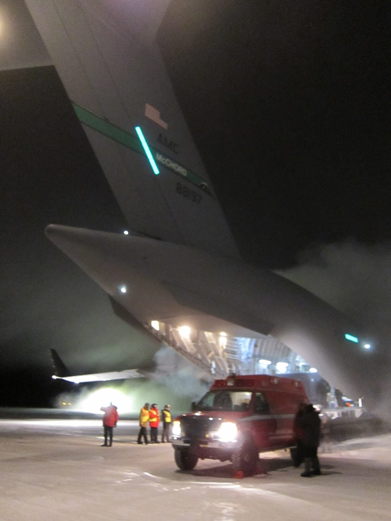 Airmen from the 62nd and 446th Airlift Wings, alongside aeromedical evacuation and Critical Care Air Transport Team Airmen, successfully land during the first ever mid-winter Antarctic mission and evacuation of an ailing government contractor June 30. (U.S. Air Force courtesy photo)