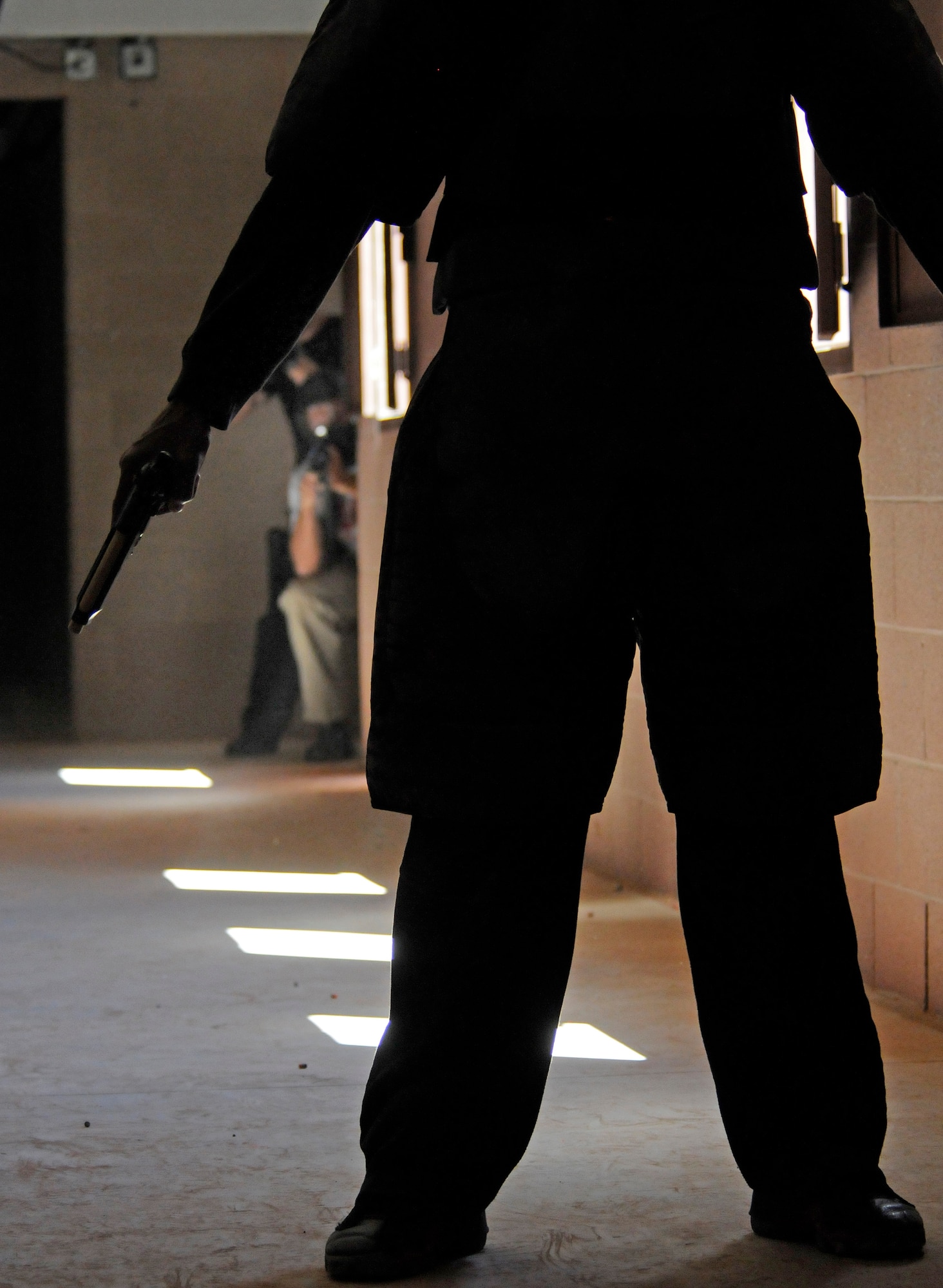 An “active shooter” is seen surrendering his weapon to 50th Security Forces Squadron Airmen from Schriever Air Force Base, Colo., during a training exercise held at nearby Fort Carson last year. An active shooter can cause a life-threatening situation and taking proper precautions can be the difference between life and death. (U.S. Air Force photo/Dave Ahlschwede)
