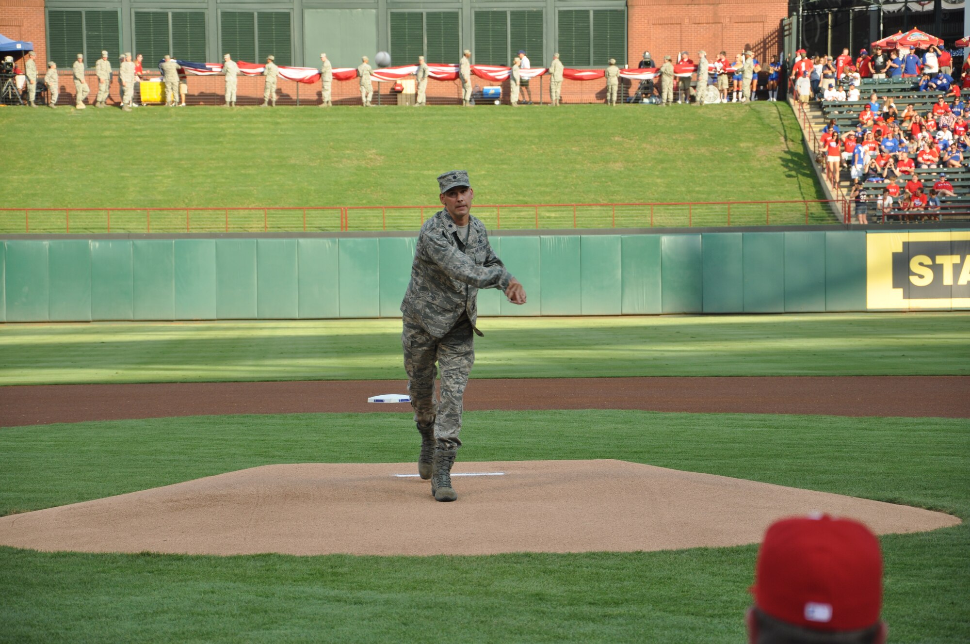 Lt. Col. Brett Ashworth, 344th Recruiting Squadron commander, throws out the first pitch before the Texas Rangers game July 4. (USAF photo/courtesy photo)