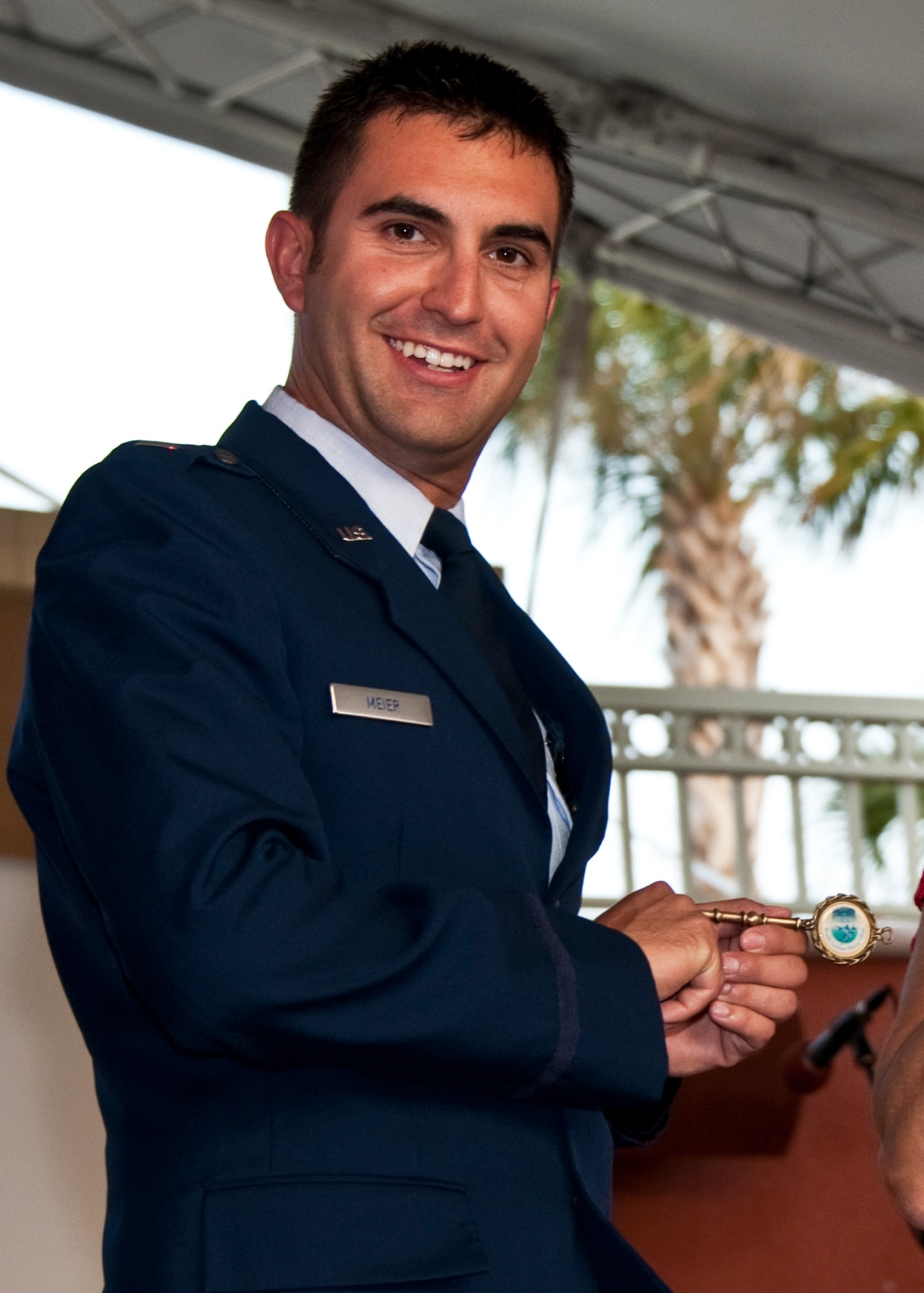 1st Lt. Nathaniel Meier, a flight test engineer with the Operational Flight Program Combined Test Force, was the first Eglin Airman to be recognized at the Red, White and Blue Celebration at the Destin HarborWalk June 30.  Community leaders honored the lieutenant for immense bravery and courage in saving two lives out of a rip current on Okaloosa Island shores. The third annual summer-long festivities will pay tribute to local heroes and military members from the surrounding military communities of Eglin Air Force Base, Hurlburt Field and Duke Field. Members being
recognized are presented with a key to the city of Destin.  (U.S. Air Force photo/Randy Gon)
