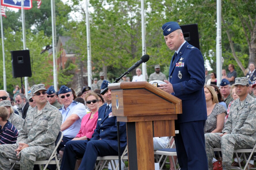 Col. Christopher Coffelt, 90th Missile Wing commander, addresses the audience after assuming command of the 90th MW June 30 during a change-of-command ceremony on the Argonne Parade Field. (U.S. Air Force photo by Blaze Lipowski)
