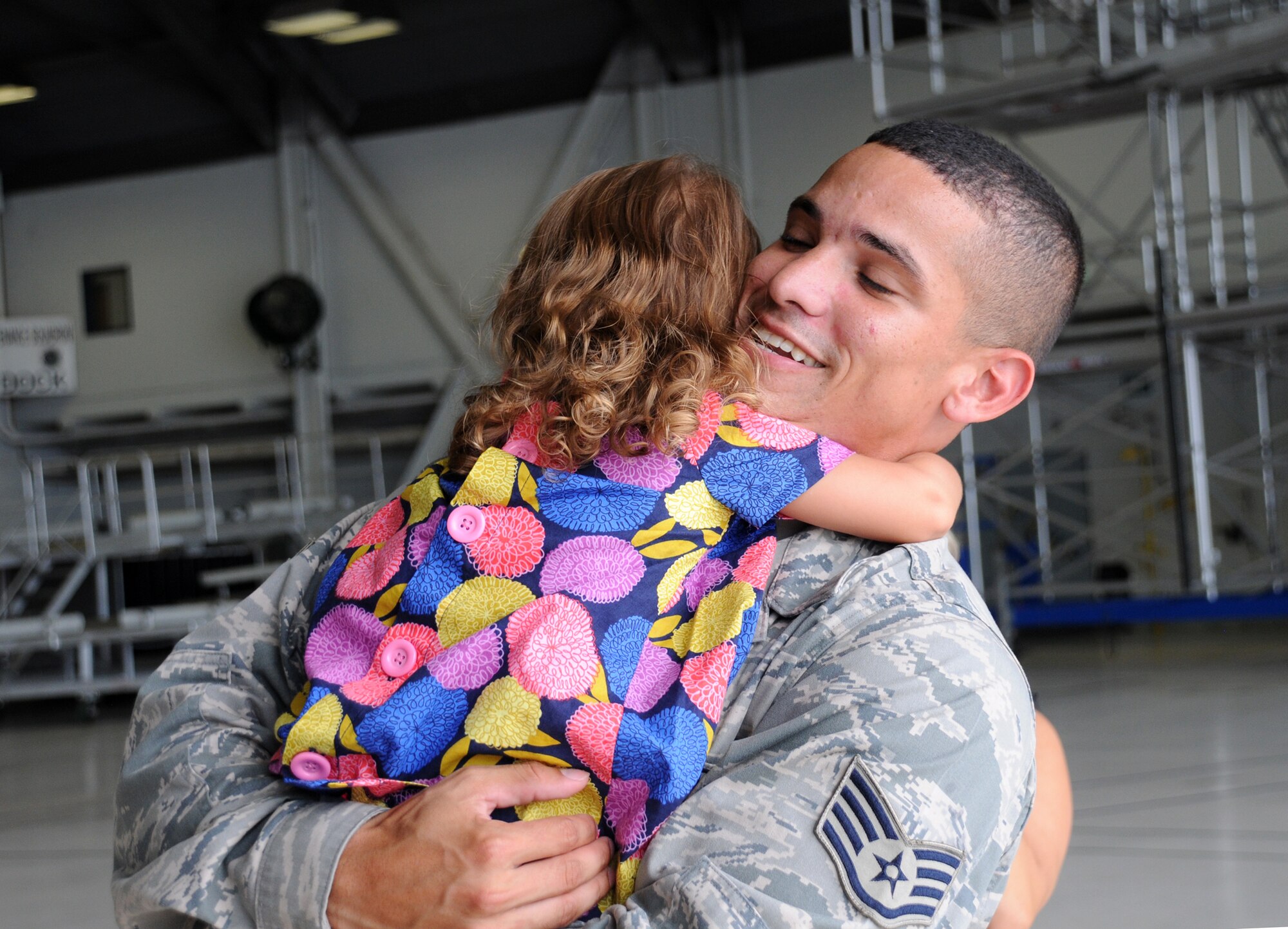 MacDill Air Force Base, Fla. --  Staff Sgt. Josh Lopez missed a lot of things during his deployment with the 90th Expeditionary Air Refueling Squadron, but his daughter Giana missed him more.  Lopez, a native of Riverview, Fla., is a medic with the 63rd Squadron Medical Element, a Reserve unit in Tampa.  During his deployment, Lopez provided medical care for the members of his unit allowing them to safely conduct 66 refueling missions.  (Official U.S. Air Force photo by Staff Sgt. Shawn Rhodes)