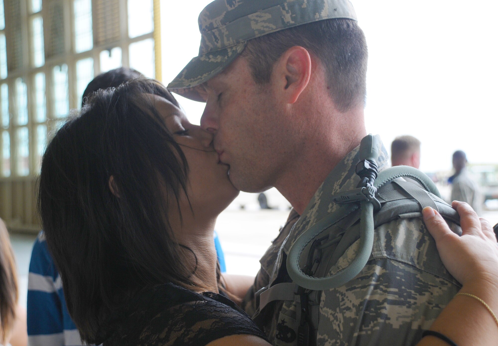 MacDill Air Force Base, Fla. -- It is a sweet reunion for Master Sgt. Adam Strickland and his wife Hattie.  Strickland returned moments before from a deployment with the 90th Expeditionary Air Refueling Squadron.  During his deployment, Strickland’s job helped the unit offload 4.5 million pounds of fuel. He is a traditional reservist with the 927th Air Refueling Squadron at MacDill, where he works as a maintainer.  He and his wife Hattie make Gibsonton, Fla. their home.(Official U.S. Air Force photo by Staff Sgt. Shawn Rhodes)