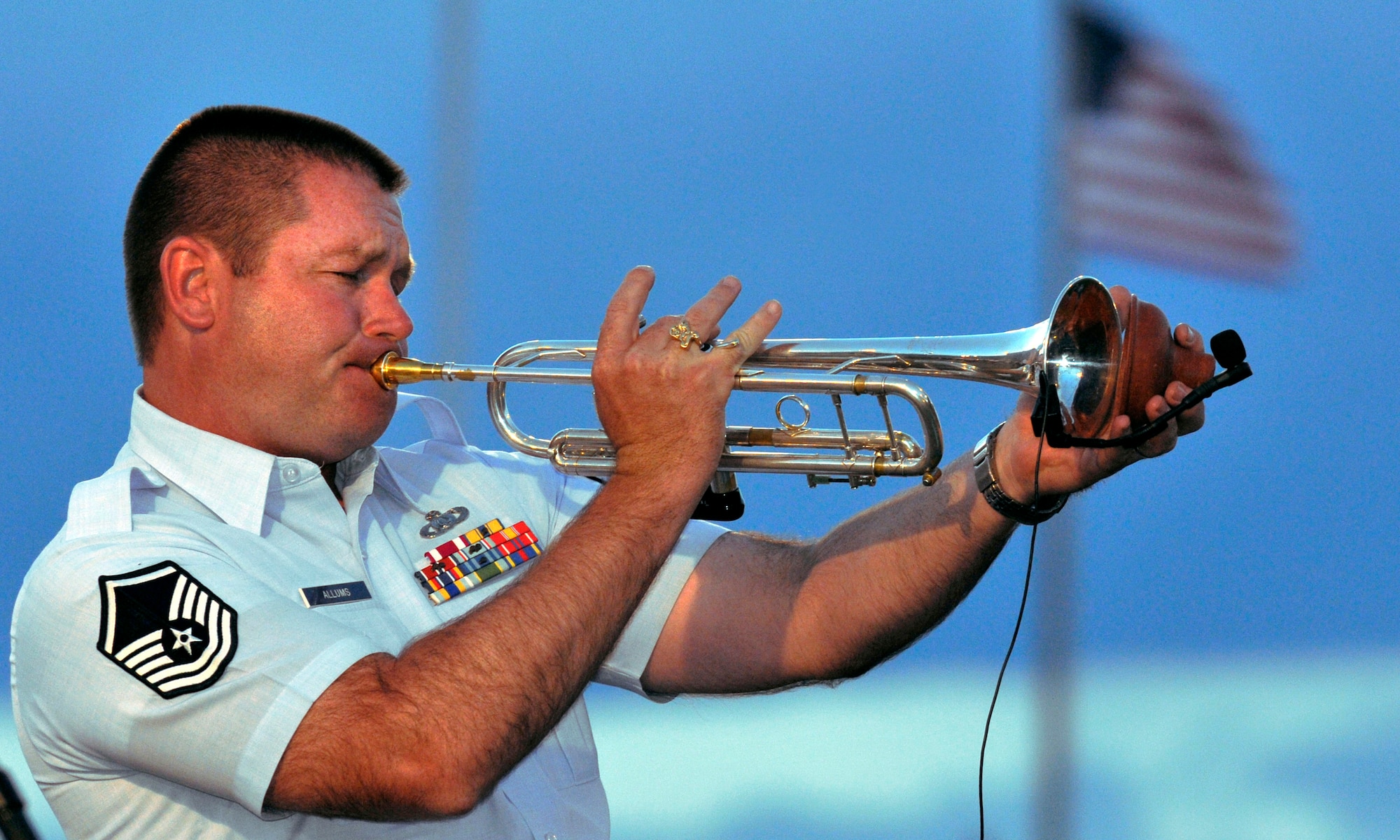 Master Sgt. Tim Allums performs at the Air Force Academy's Independence Day celebration July 4, 2011, at Falcon Stadium in Colorado Springs, Colo. Sergeant Allums is a trumpet player with the Air Force Academy Band and a native of Beaumont, Texas. (U.S. Air Force photo/Megan Davis)