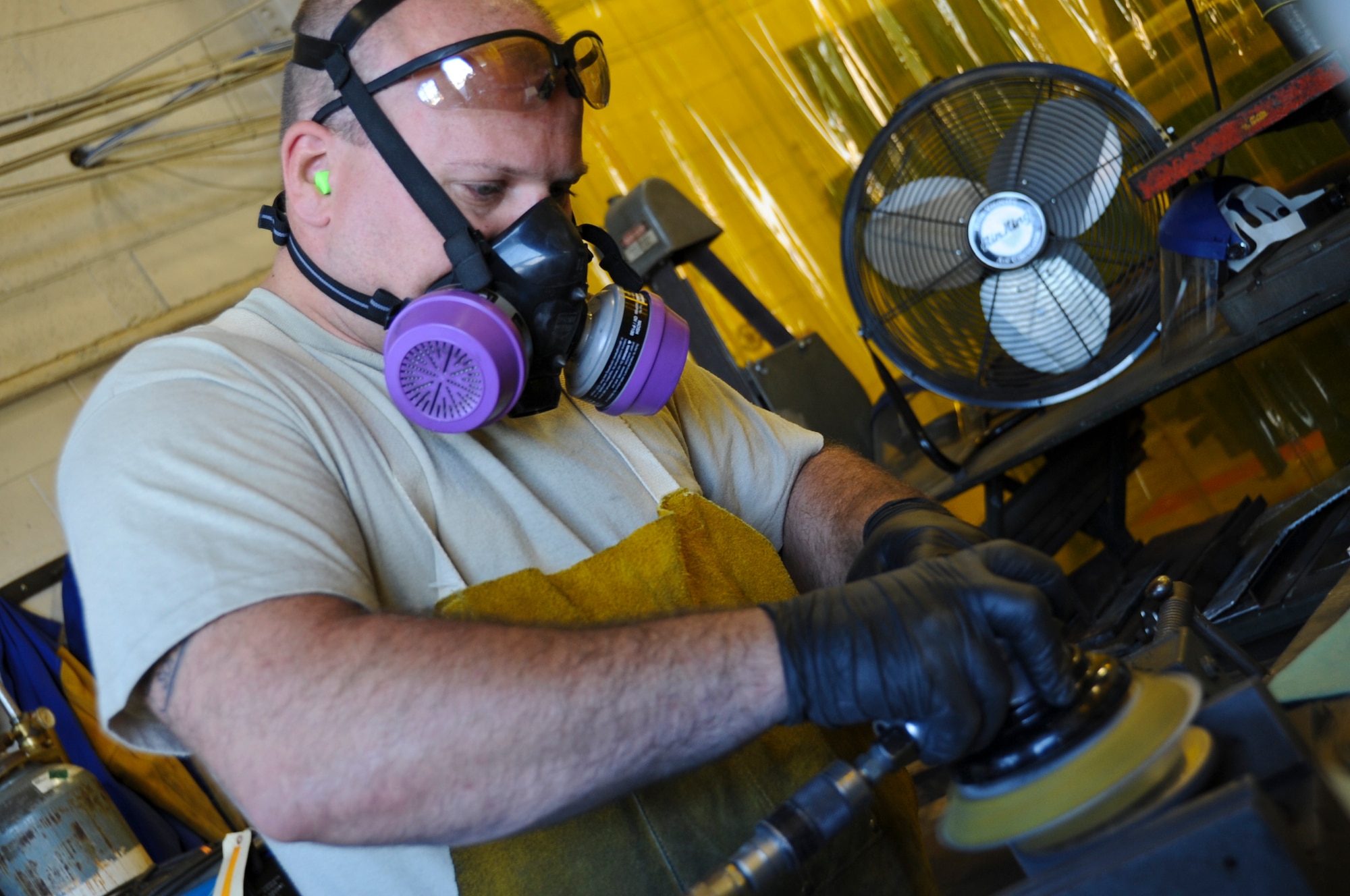 JOINT BASE MCGUIRE-DIX-LAKEHURST, N.J. -- Senior Airman John Ruffner
III, 87th Logistics Readiness Squadron, sands down a vehicle part at the 87th LRS vehicle maintenance shop. Ruffner has been assigned to the LRS for four-and-a-half years. (U.S. Air Force photo by Senior Airman David Carbajal/Released)