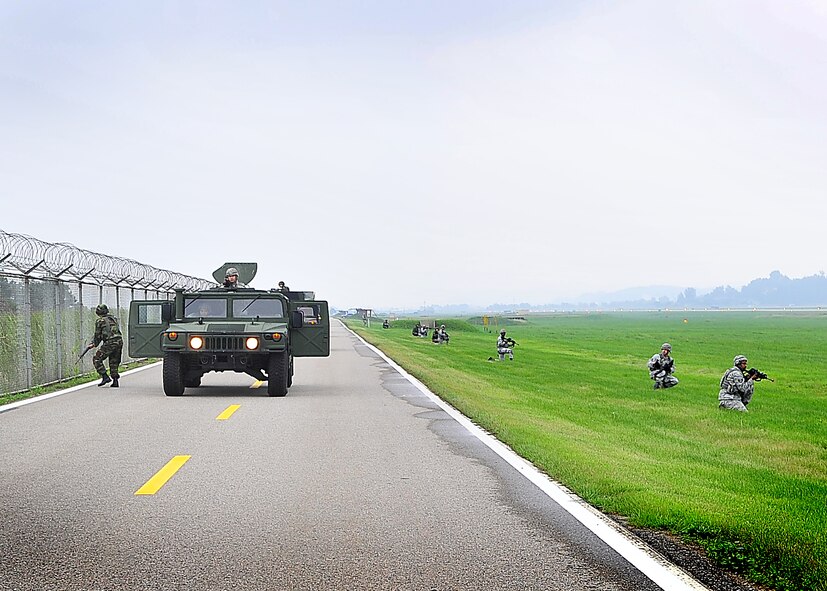 Members of the 51st Security Forces Squadron performed mounting and un-mounting operations training during the combat readiness course at Osan Air Base, June 27.  During training, SF members' reacted to [simulated] improvised explosive devices as well as [hostile] contact left and right drills.  Security Forces members are responsible for ensuring the safety of bases, weapons, property and personnel from hostile forces.
