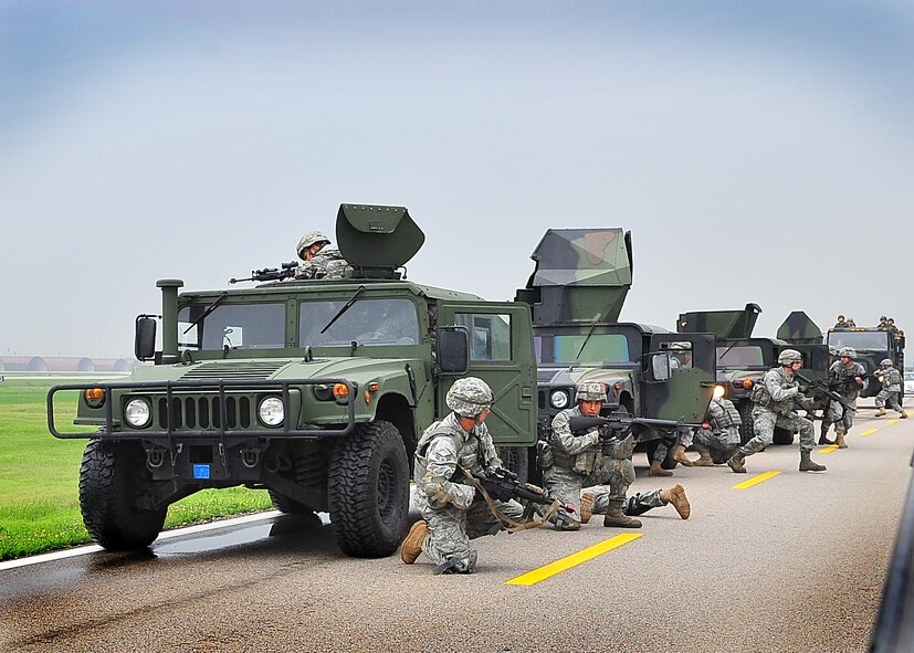 Members of the 51st Security Forces Squadron performed mounting and un-mounting operations training during the combat readiness course at Osan Air Base, June 27.  During training, SF members' reacted to [simulated] improvised explosive devices as well as [hostile] contact left and right drills.  Security Forces members are responsible for ensuring the safety of bases, weapons, property and personnel from hostile forces.