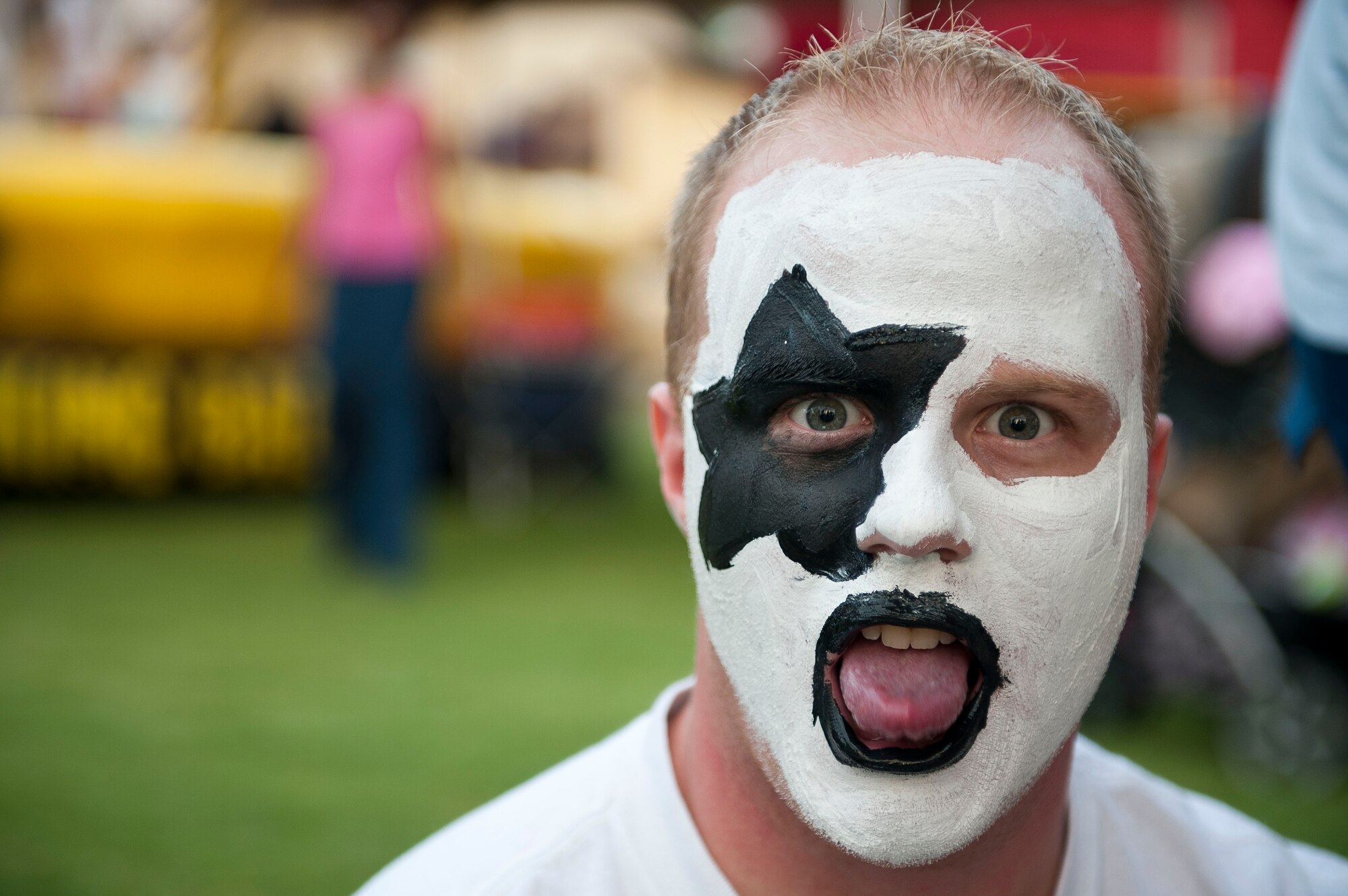 Senior Airman Patrick Allen, 39th Maintenance Squadron, poses for a photograph during a face-painting session July 2, 2011, at Arkadas Park, Incirlik Air Base, Turkey. Team Incirlik celebrated Independence Day with various activities, food and live entertainment. (U.S. Air Force photo by Tech. Sgt. Michael B. Keller/Released)