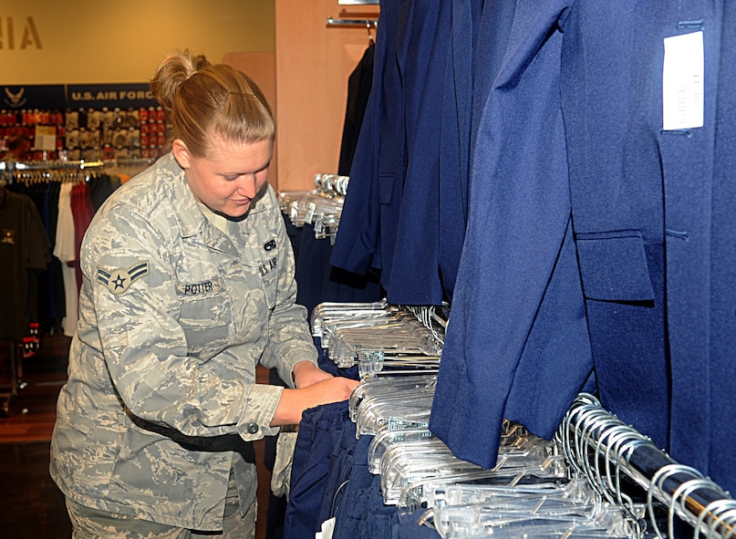 Airman 1st Class Joycelyn Potter, 2nd Maintenance Squadron, searches for a skirt in the new alterations shop in Military Clothing Sales on Barksdale Air Force Base, La., July 7. Alterations is a new addition to the Military Clothing Sales Base Exchange location. (U.S. Air Force photo/Senior Airman Kristin High)(RELEASED)